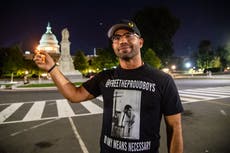 Proud Boys leader Enrique Tarrio poses holding lighter to US Capitol before starting five-month jail sentence