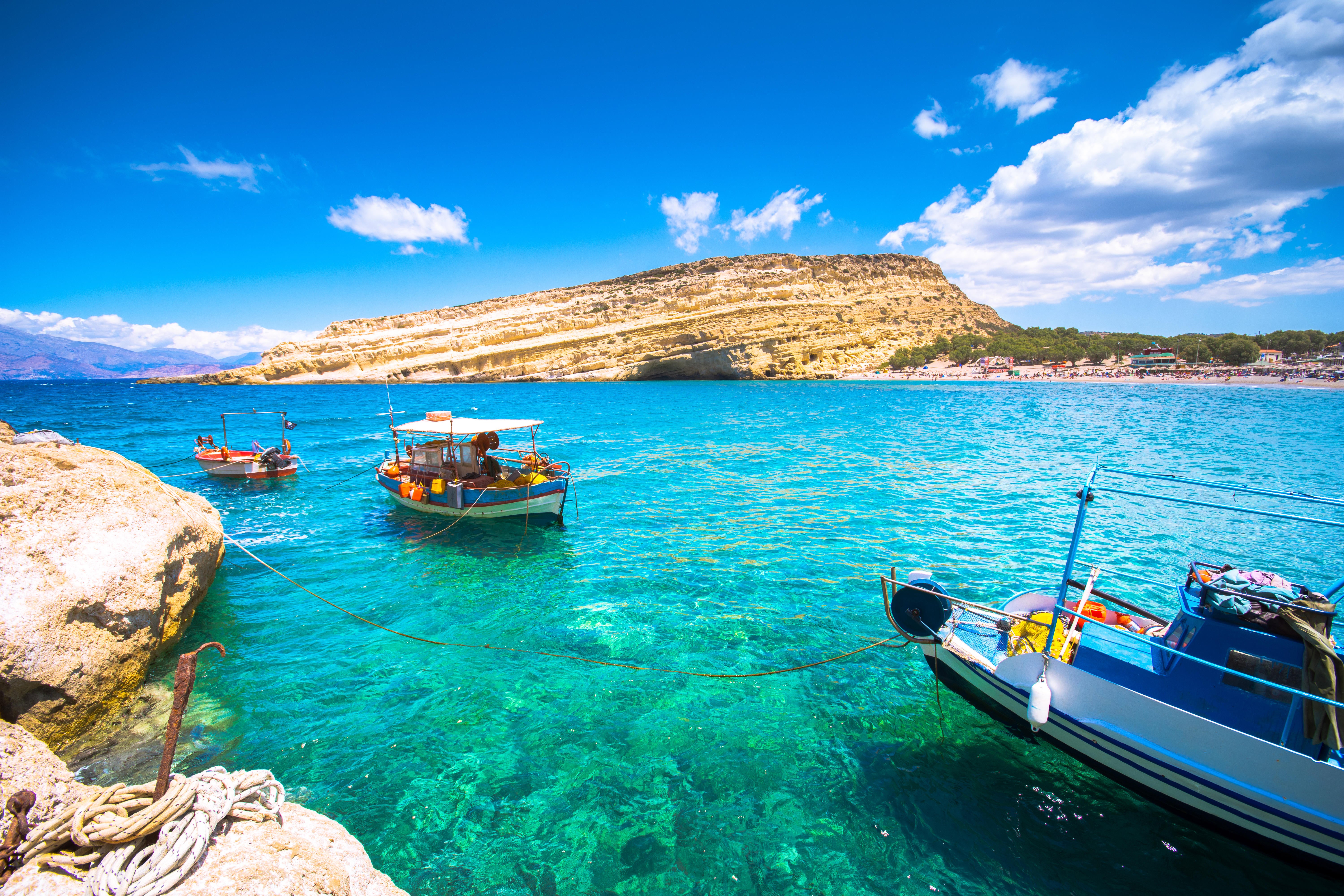 Matala beach in Crete (Alamy/PA)