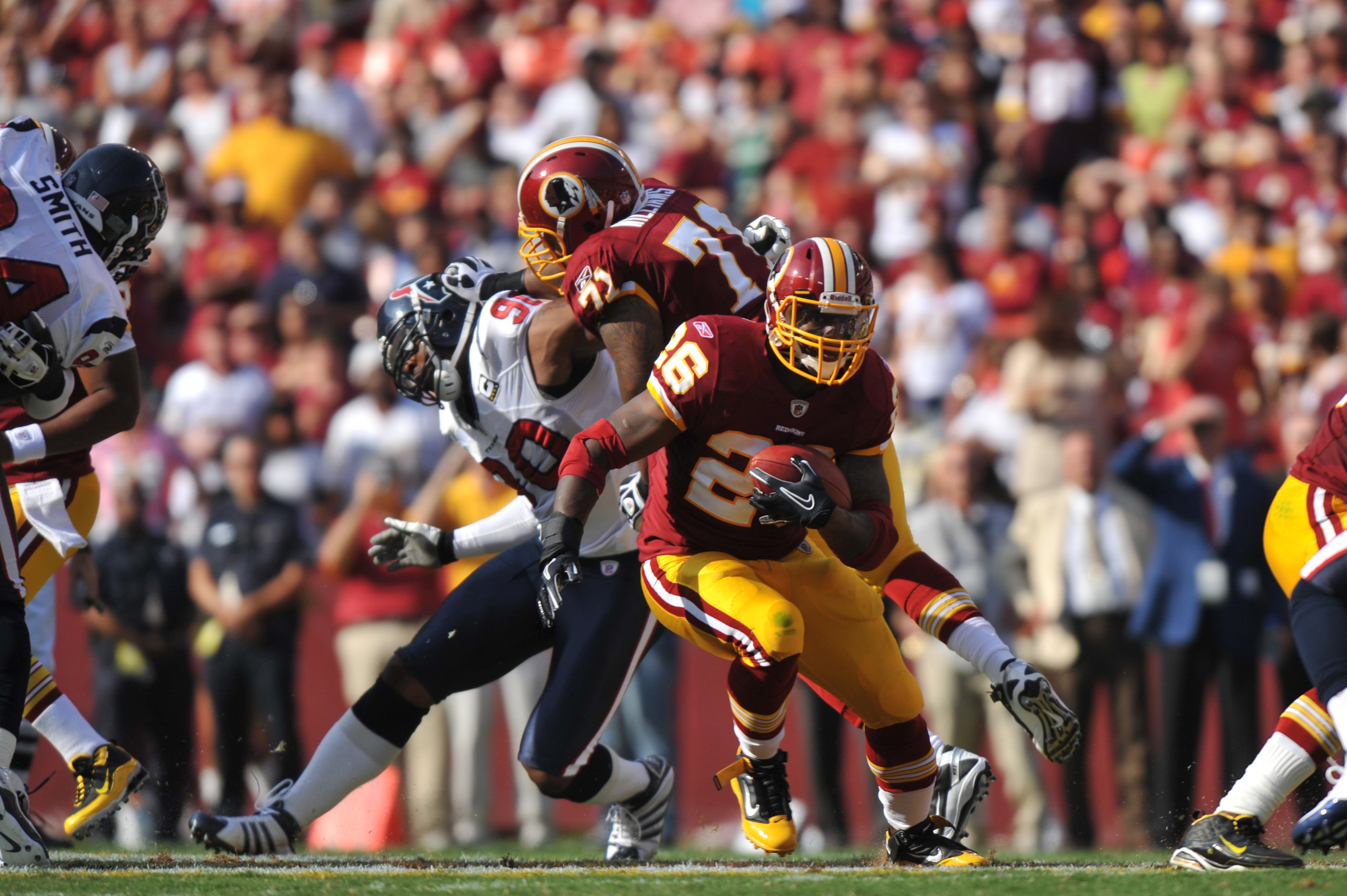 Clinton Portis #26 of the Washington Redskins runs the ball during the game against the Houston Texans at FedExField on September 19, 2010 in Landover, Maryland.