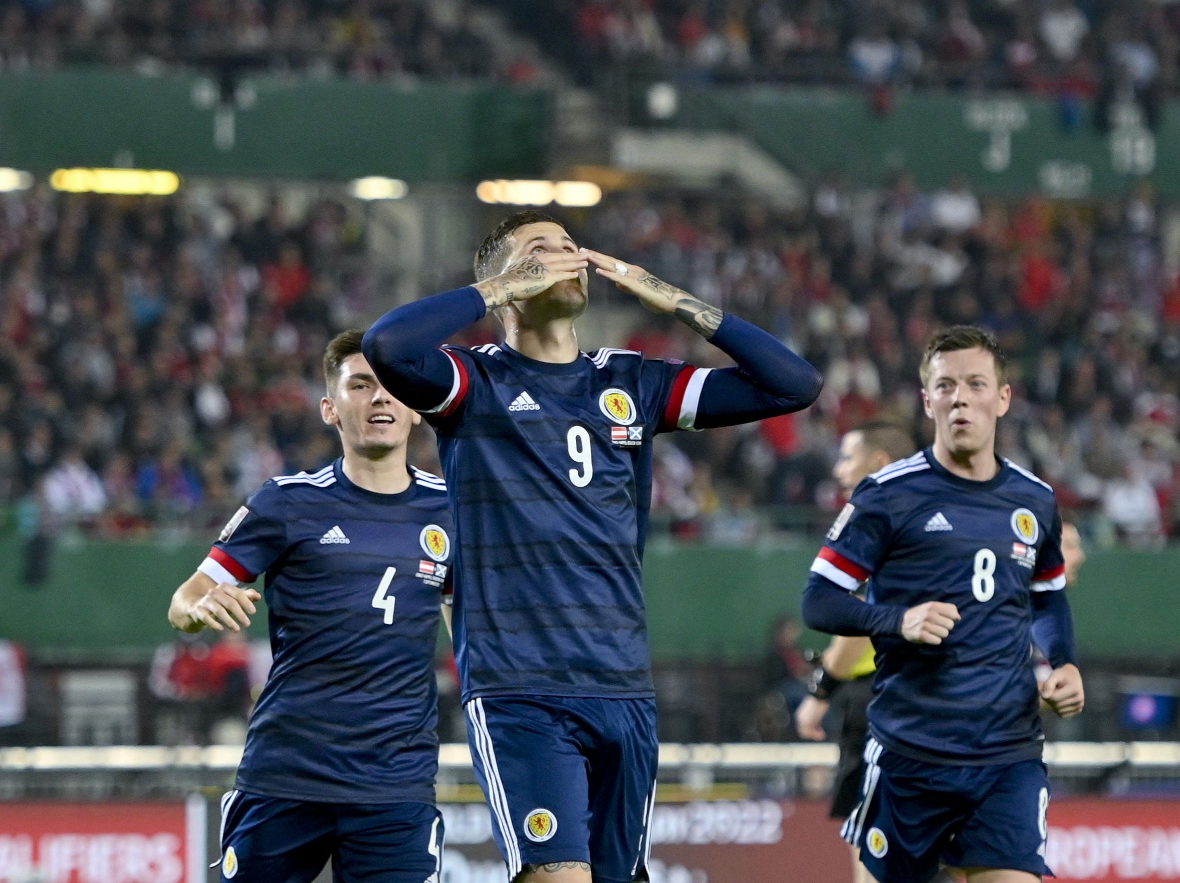 Lyndon Dykes squeezed a penalty past Daniel Bachmann in Scotland’s 1-0 win