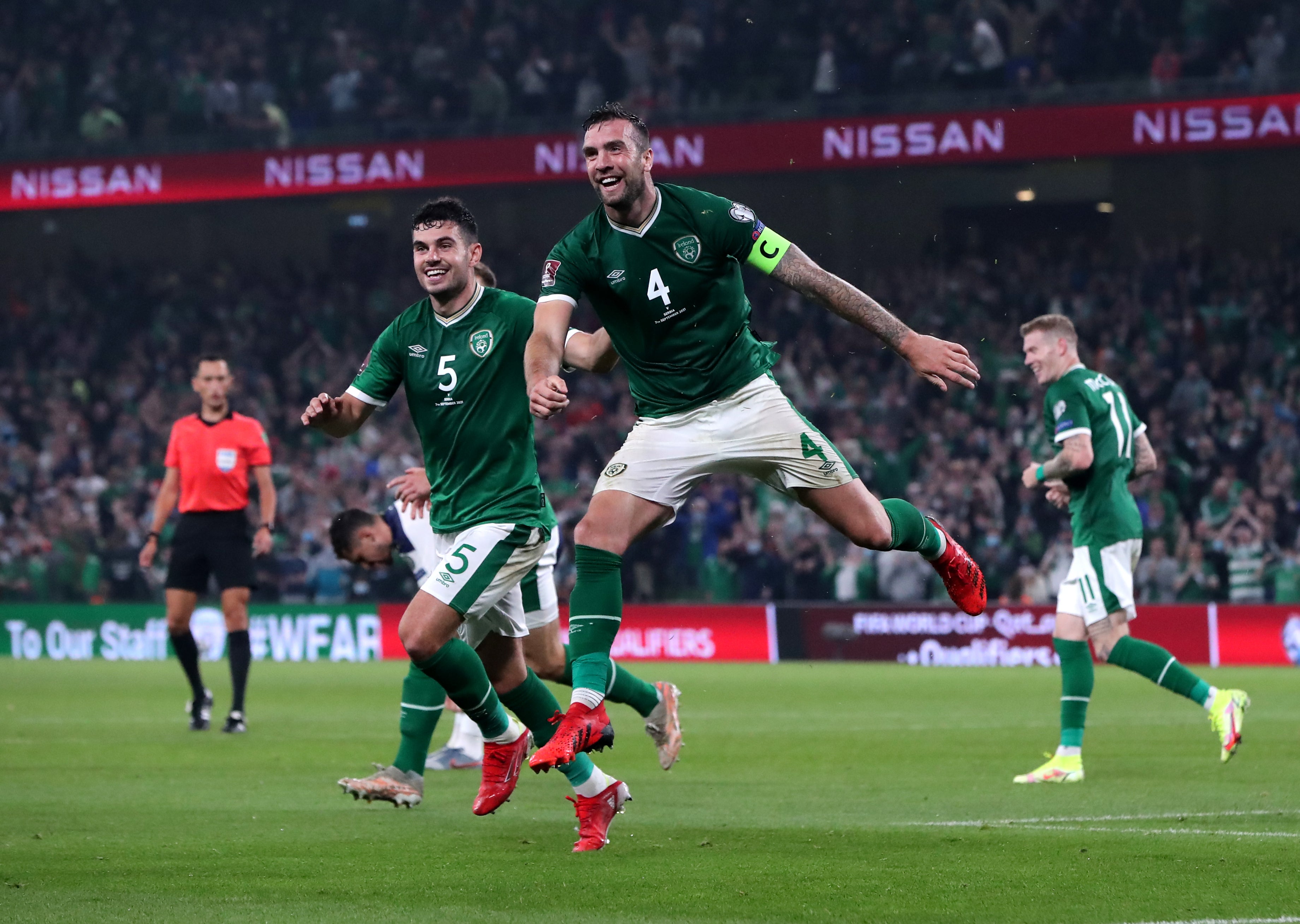 John Egan and Shane Duffy celebrate their side’s equaliser (Niall Carson/PA)