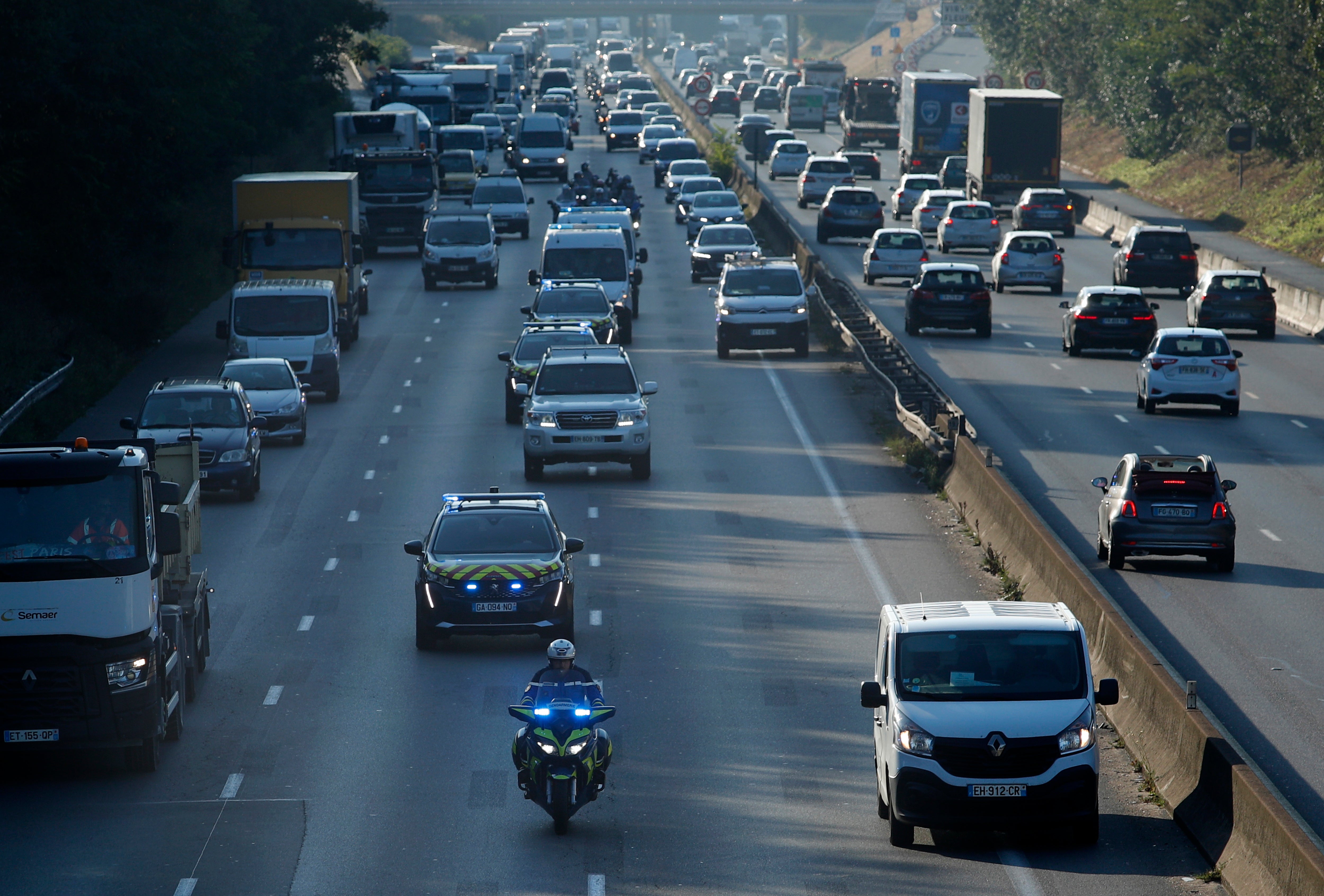 Heavy police presence escorts a convoy believed to be transporting Salah Abdelslam, accused of being involved in the 2015 Paris attacks