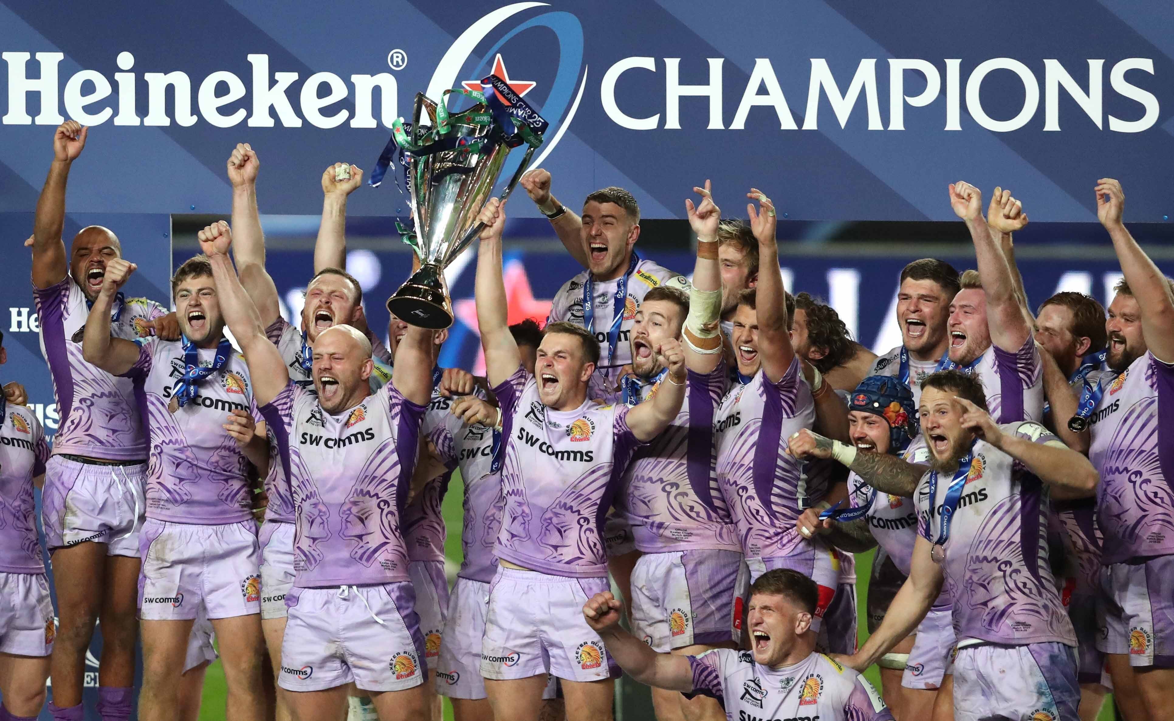 Exeter players celebrate winning the Heineken Champions Cup in 2020 (David Davies/PA)