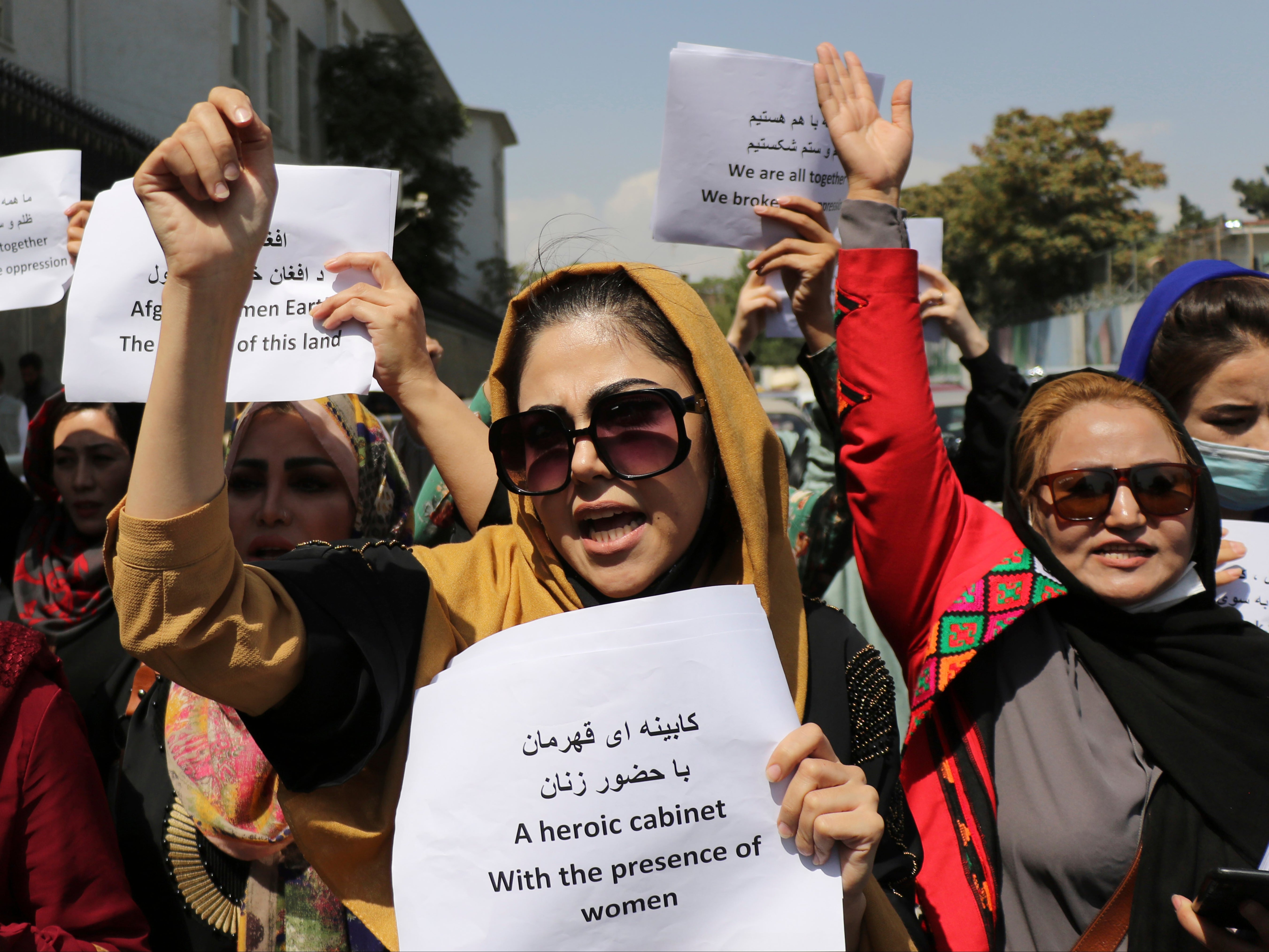 Women assemble to call for their rights under Taliban rule at a protest in the capital of Kabul in early September