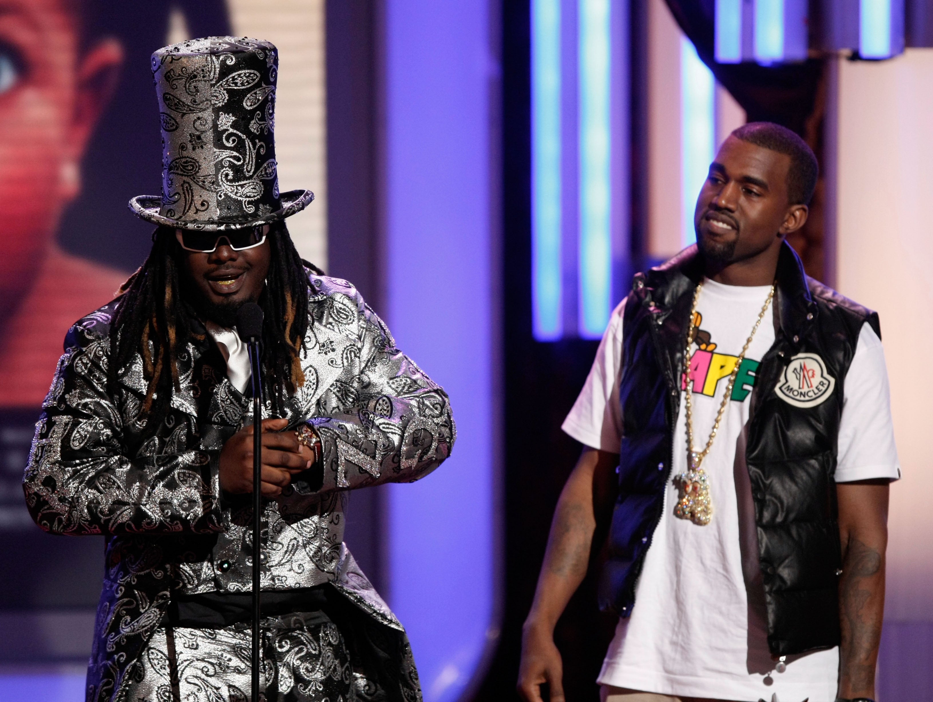 File image: T-Pain and rapper Kanye West accept the Best Collaboration award onstage during the 2008 BET Awards