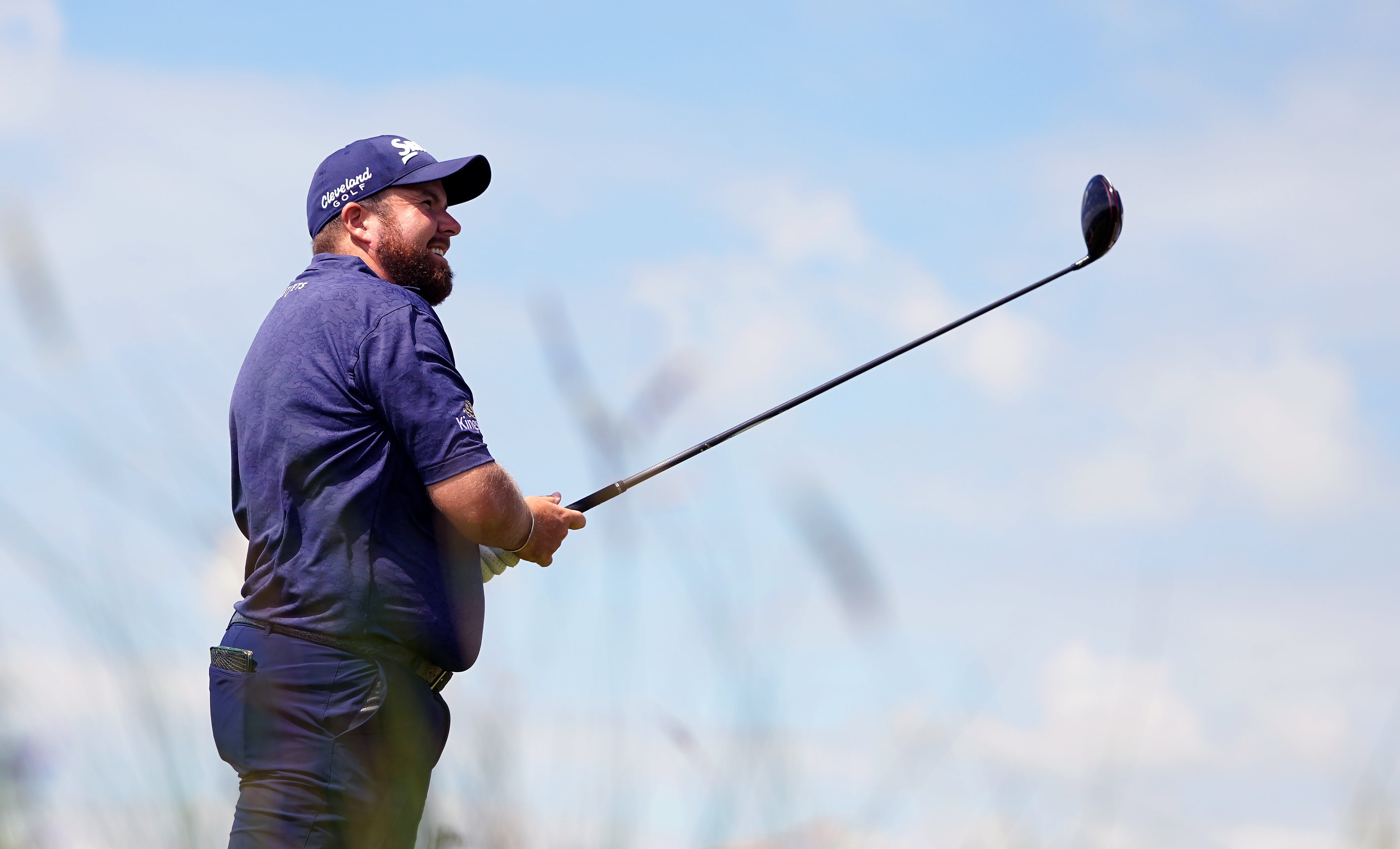 Shane Lowry tees off the seventh during day one of the Open at Royal St George’s (Gareth Fuller/PA)