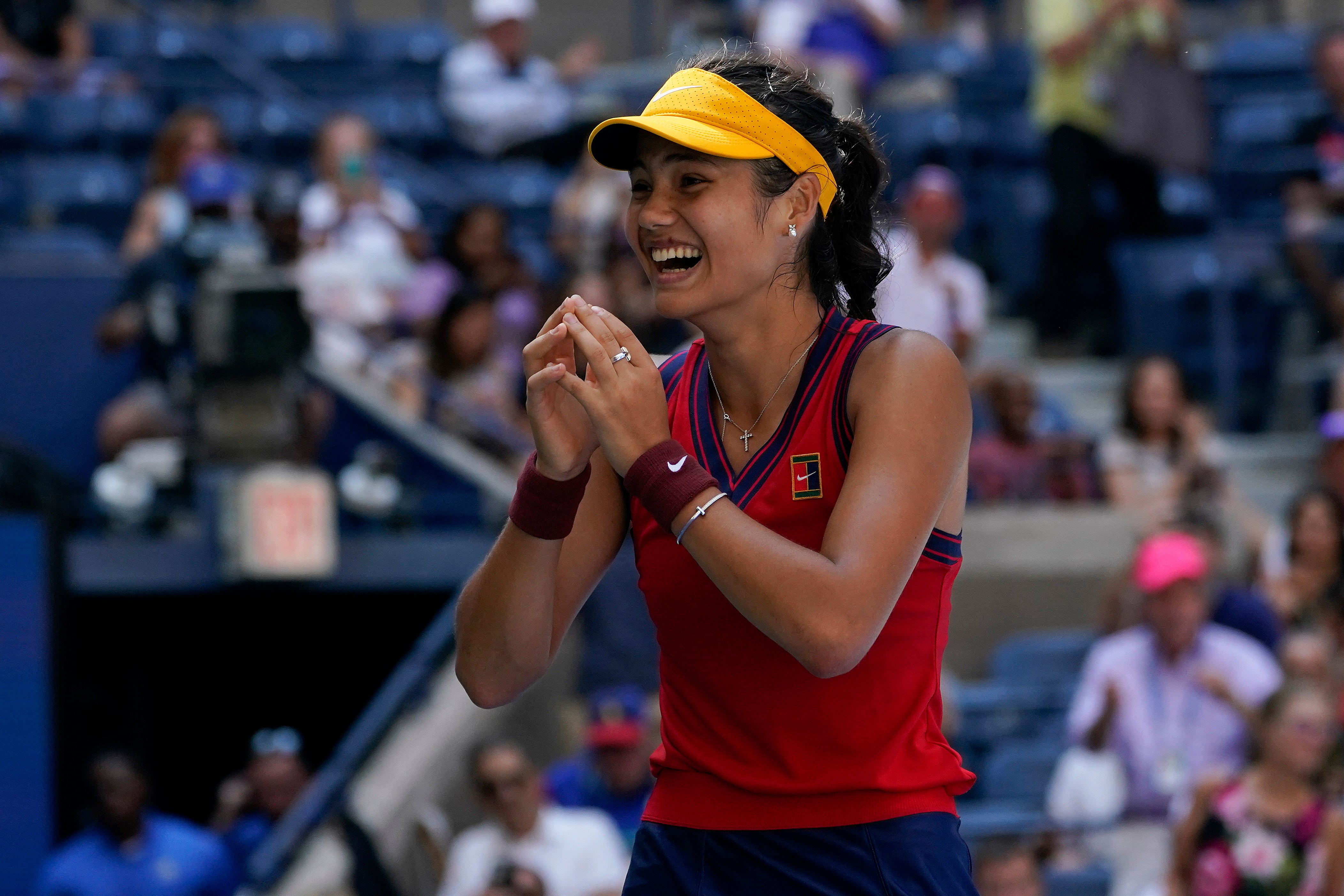 Emma Raducanu celebrates after beating Belinda Bencic in the US Open quarter-finals (Elise Amendola/AP)