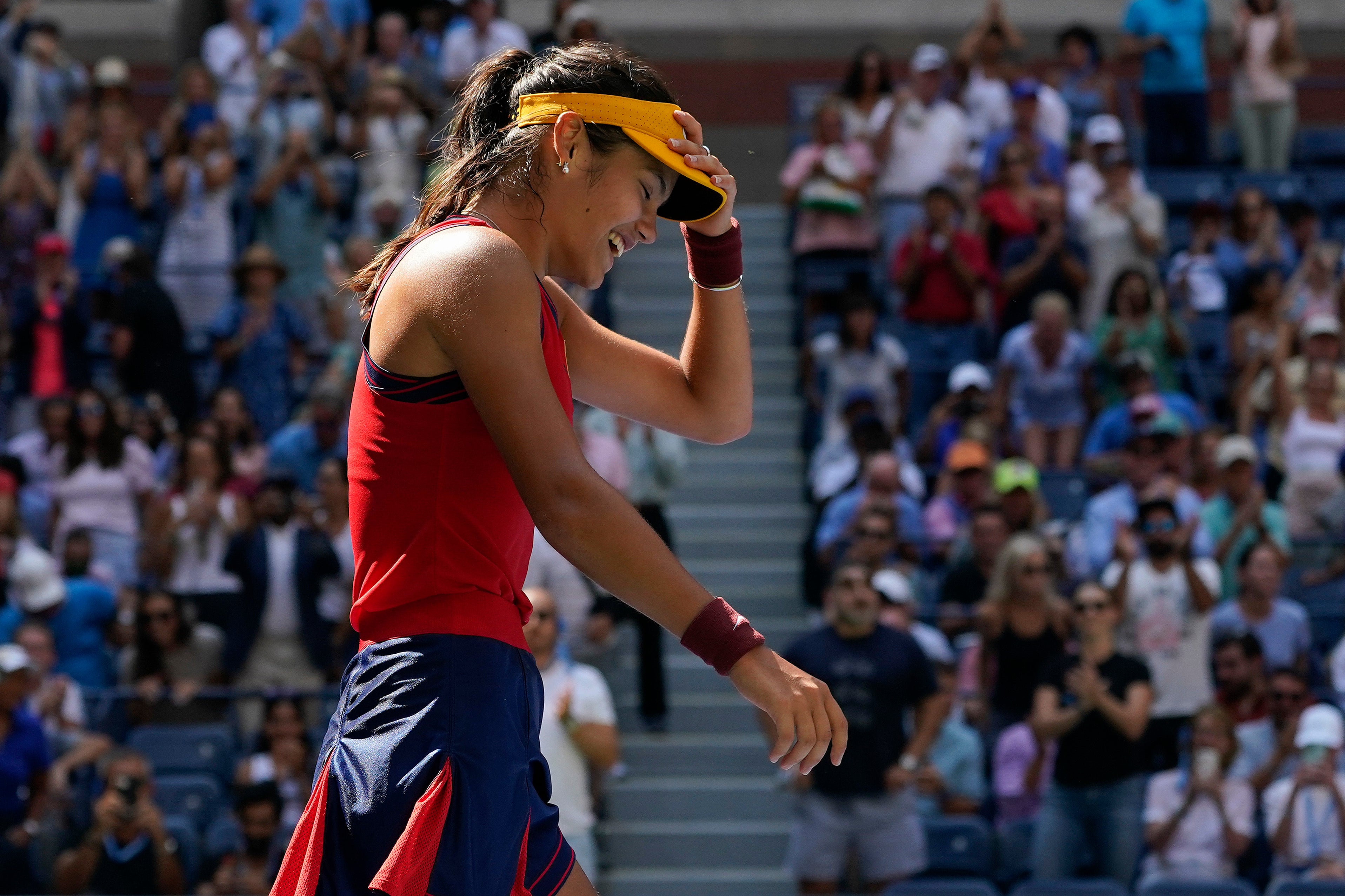 Raducanu reacts after defeating Bencic (Elise Amendola/AP)