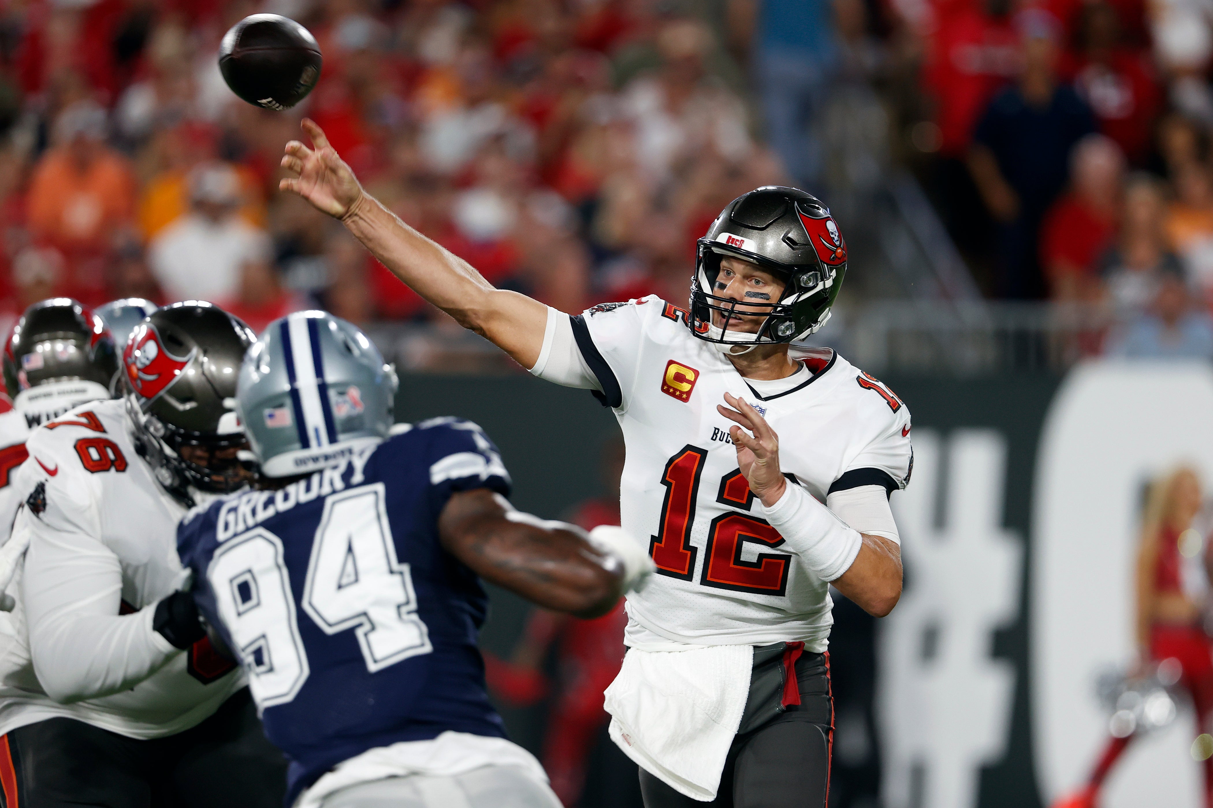 Tampa Bay Buccaneers quarterback Tom Brady (12) fires a pass against the Dallas Cowboys (Scott Audette/AP)