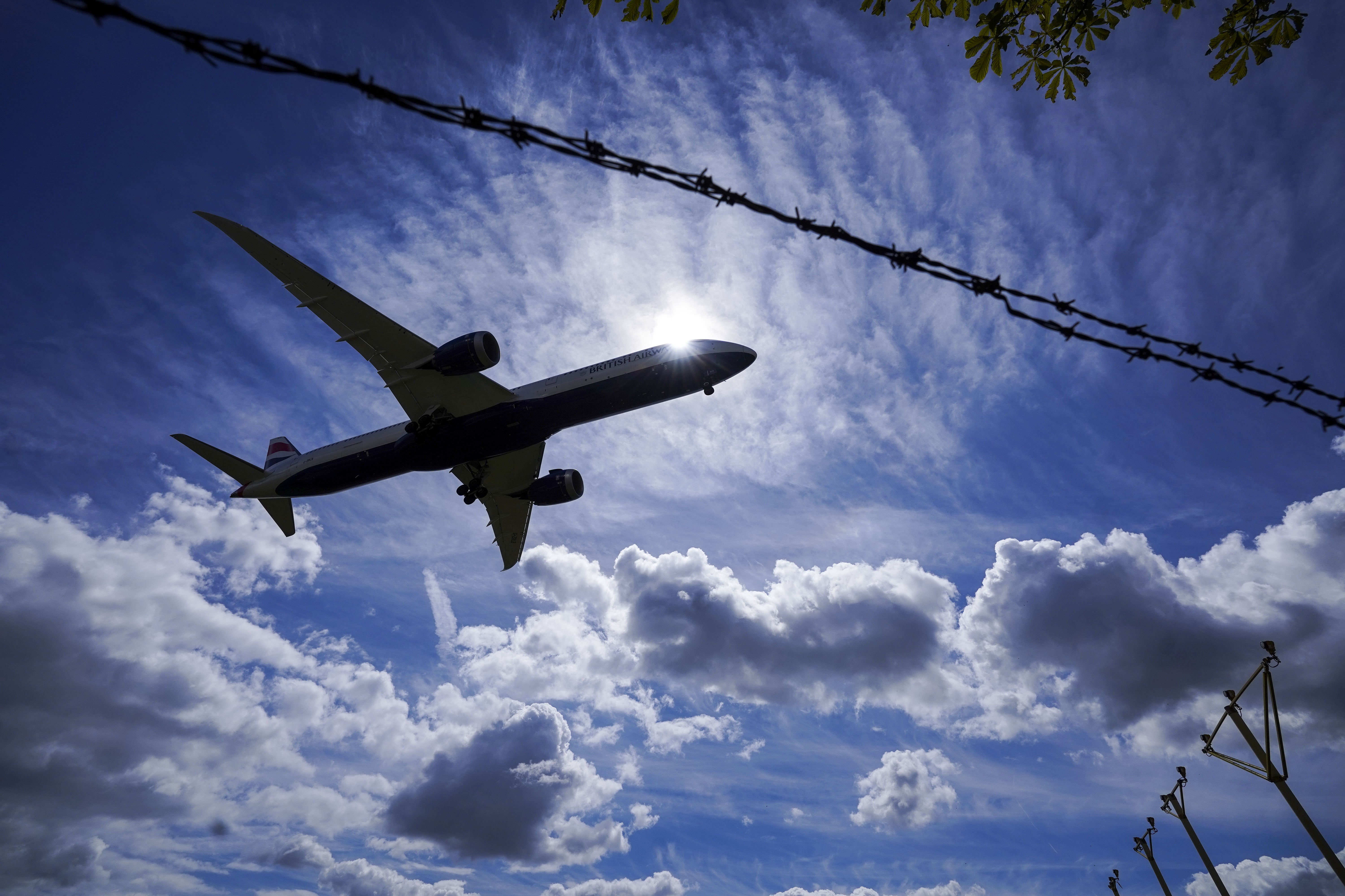 A plane lands on the southern runway at London Heathrow Airport. (Steve Parsons/PA)