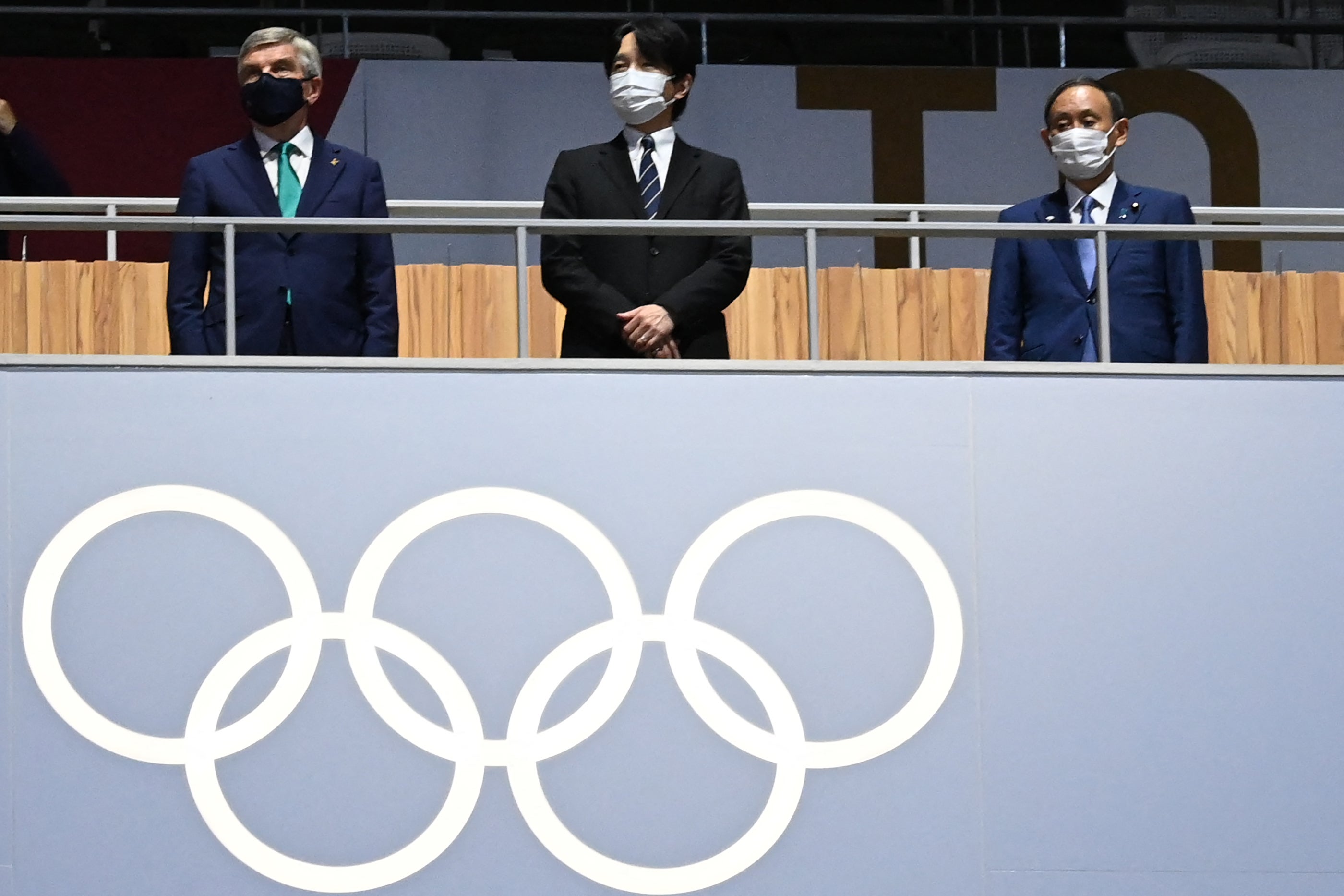 Yoshihide Suga (right), Japan’s Crown Prince Akishino (centre) and IOC president Thomas Bach attend the closing ceremony of the Tokyo 2020 Olympic Games