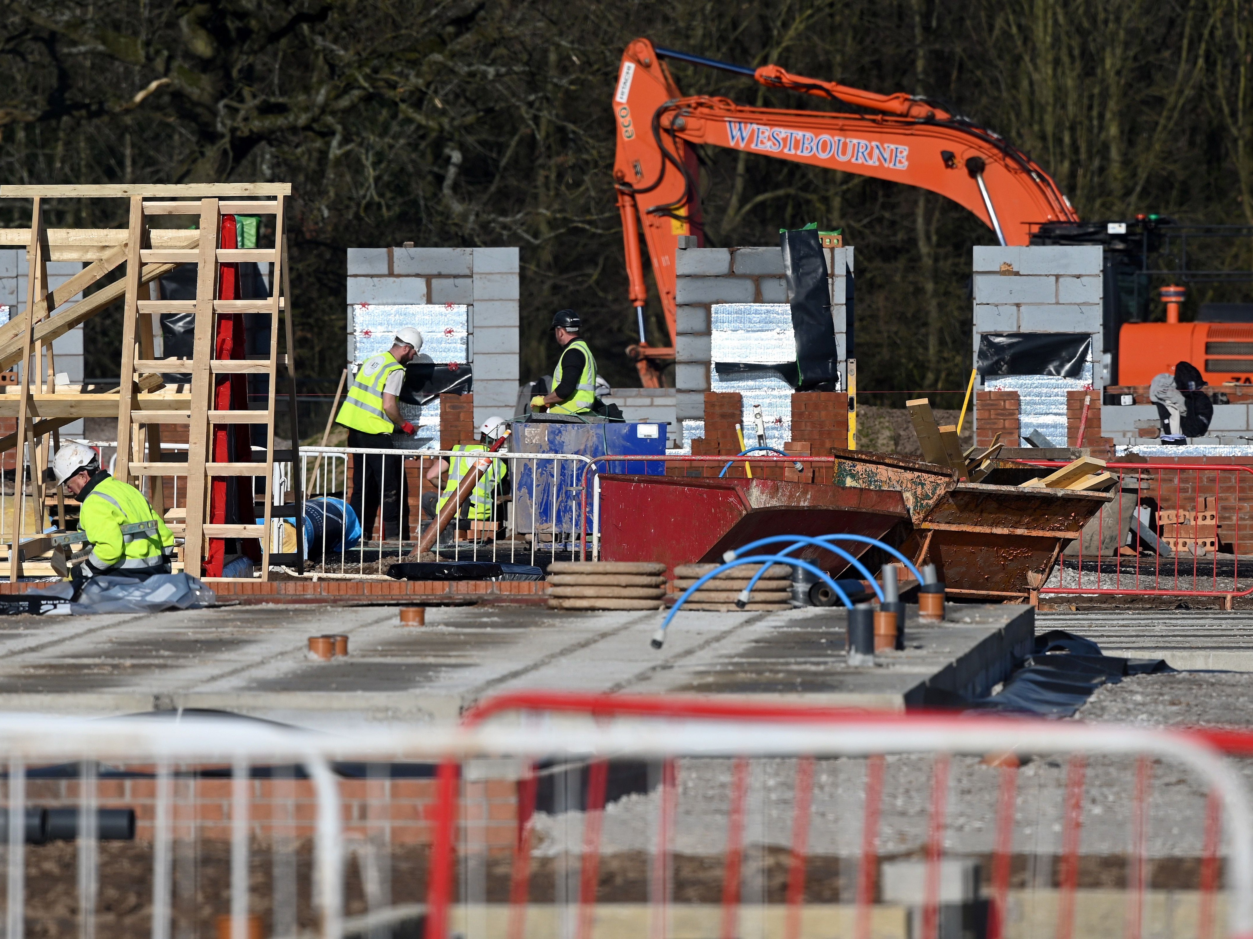 Construction work at a building site for new homes in north west England in March