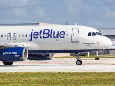 Couple banned from US airline JetBlue after refusing to wear face masks