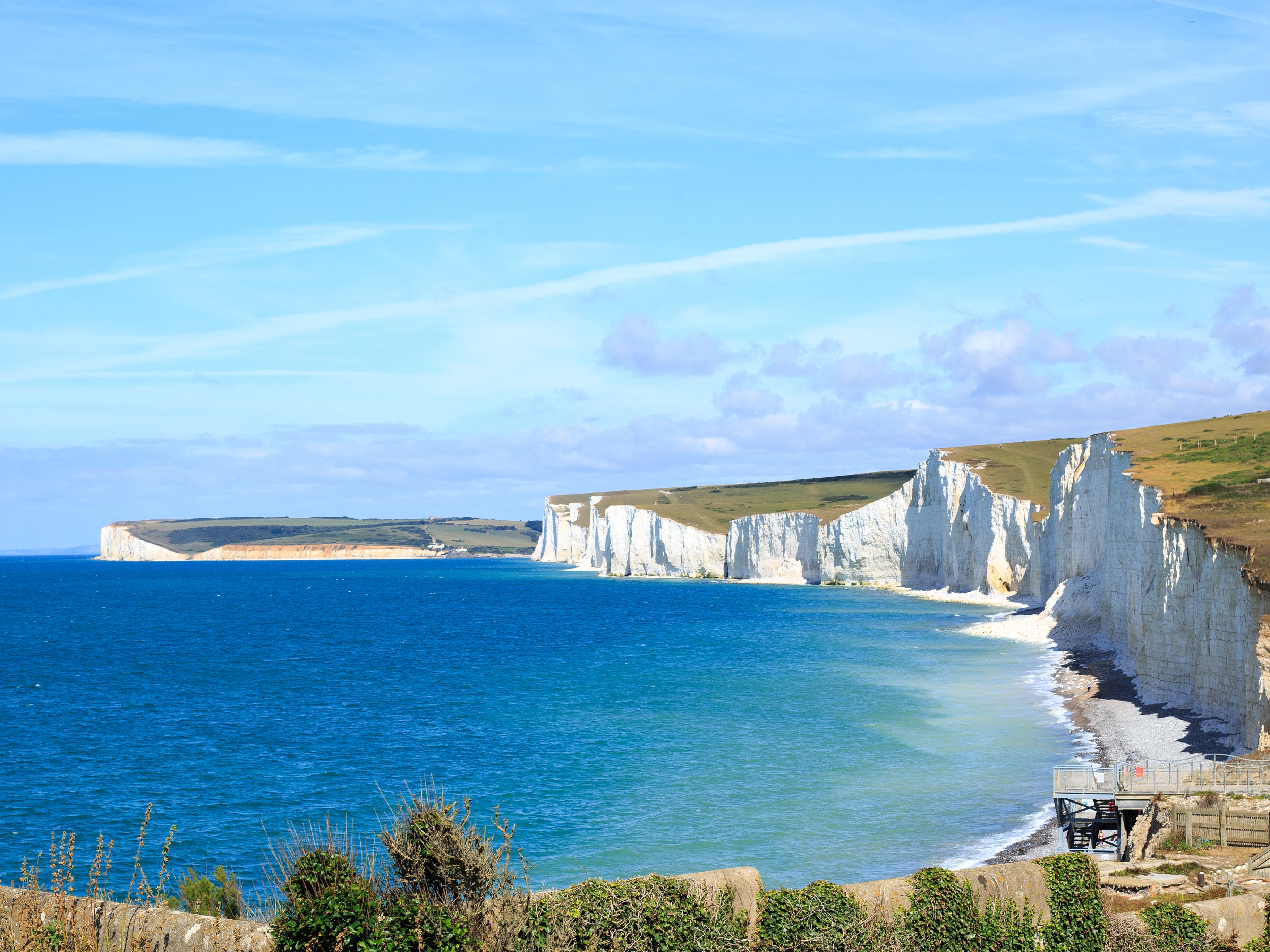 The body of the man found dead in the Channel was brought ashore near Eastbourne, Sussex Police said