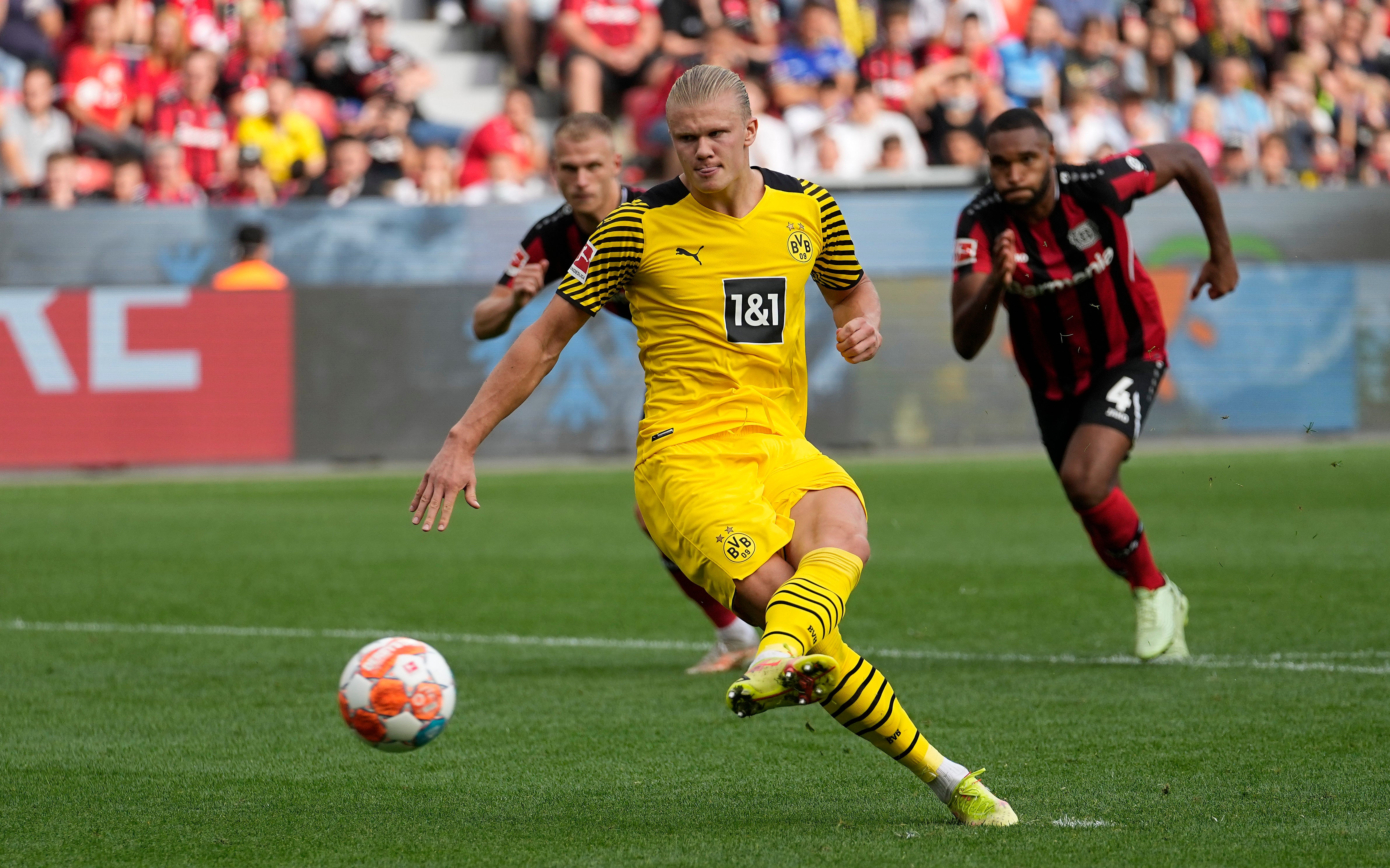 Erling Braut Haaland scored twice, including from the penalty spot, against Bayer Leverkusen