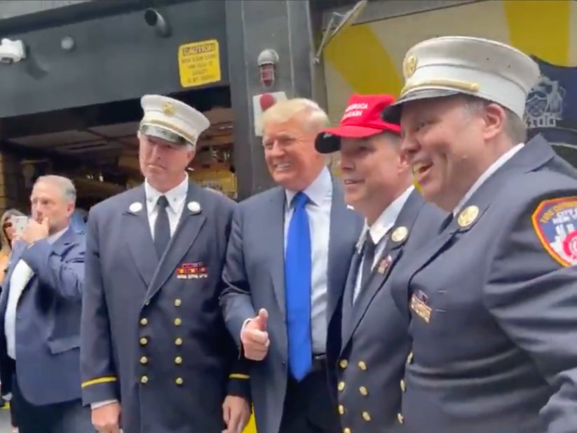 9/11 memorial news – live: Trump absent from Ground Zero but hints at 2024 run during NYPD visit