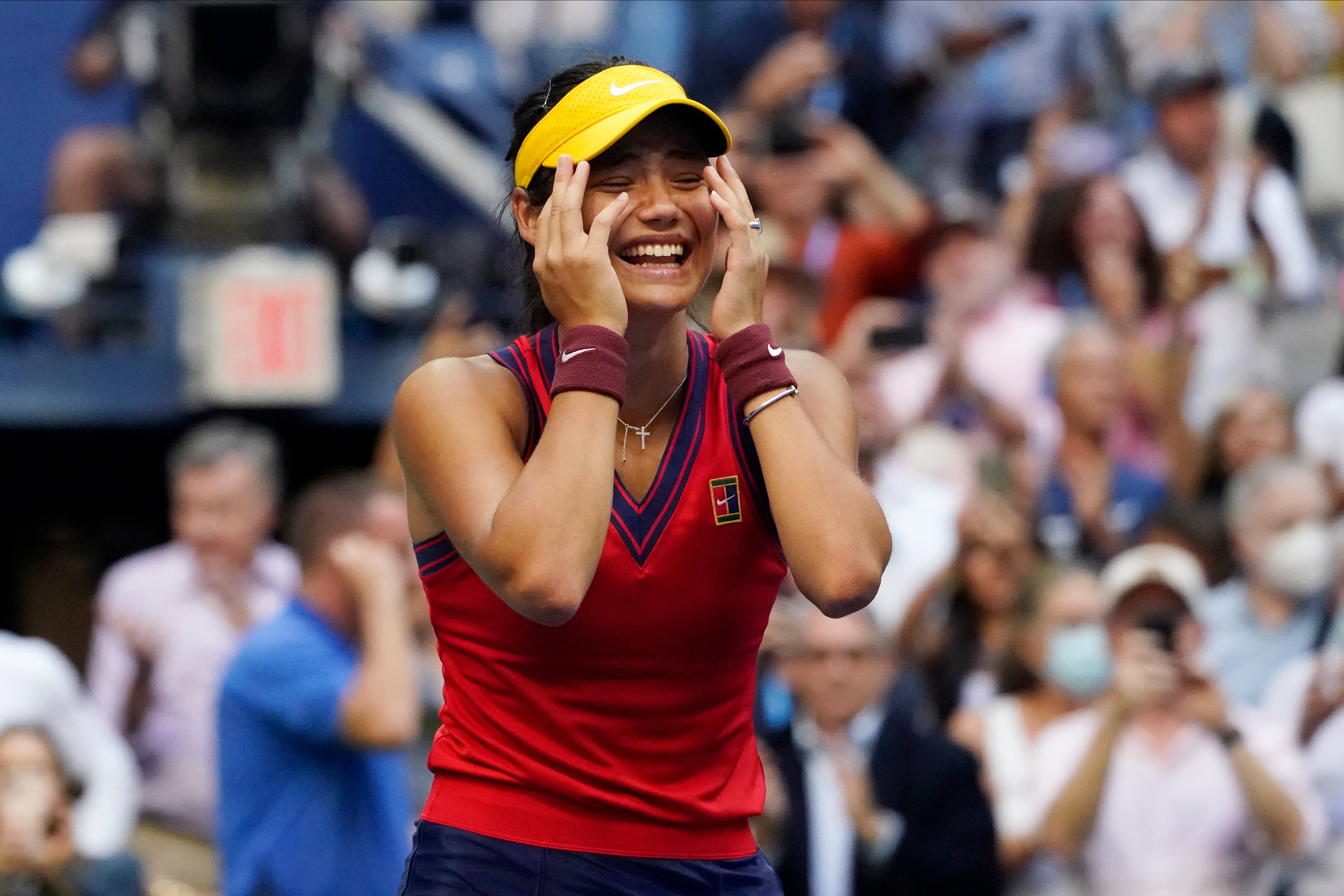 Emma Raducanu reacts to her victory with disbelief (Elise Amendola/AP)