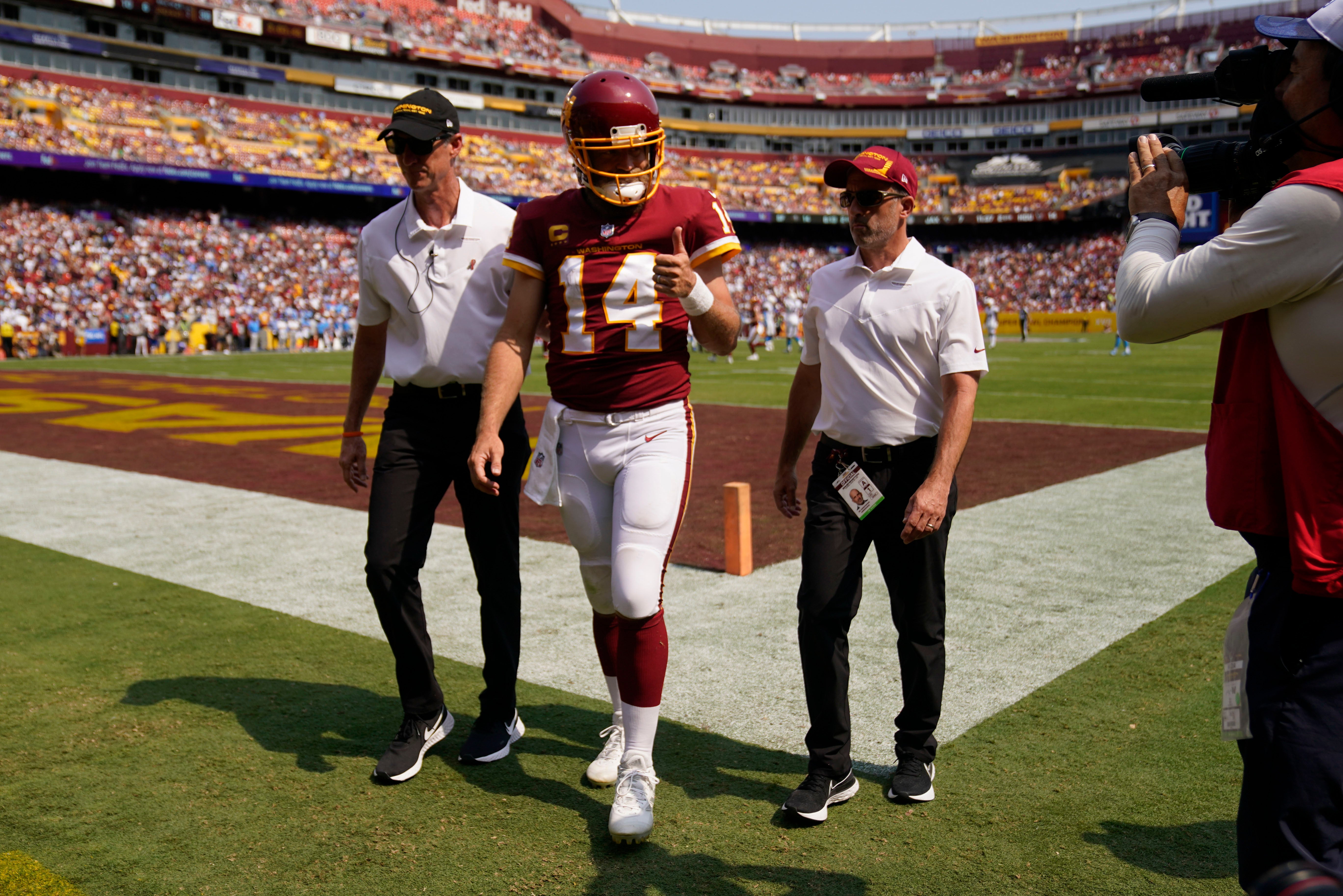 Ryan Fitzpatrick left Washington’s game early with a hip injury (Andrew Harnik/AP)