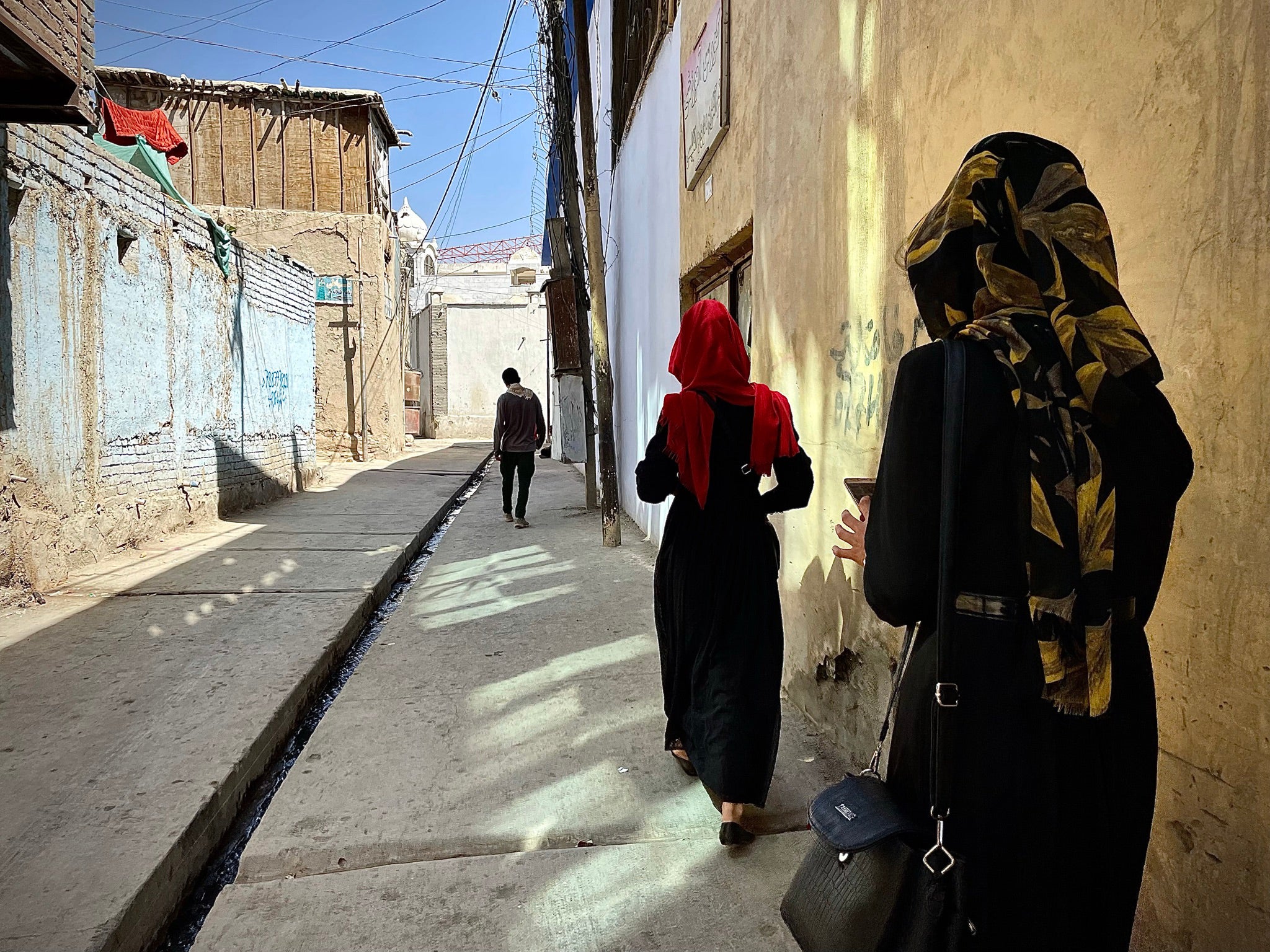 Ramzia Abdekhil and her sister set out from their home to join another protest