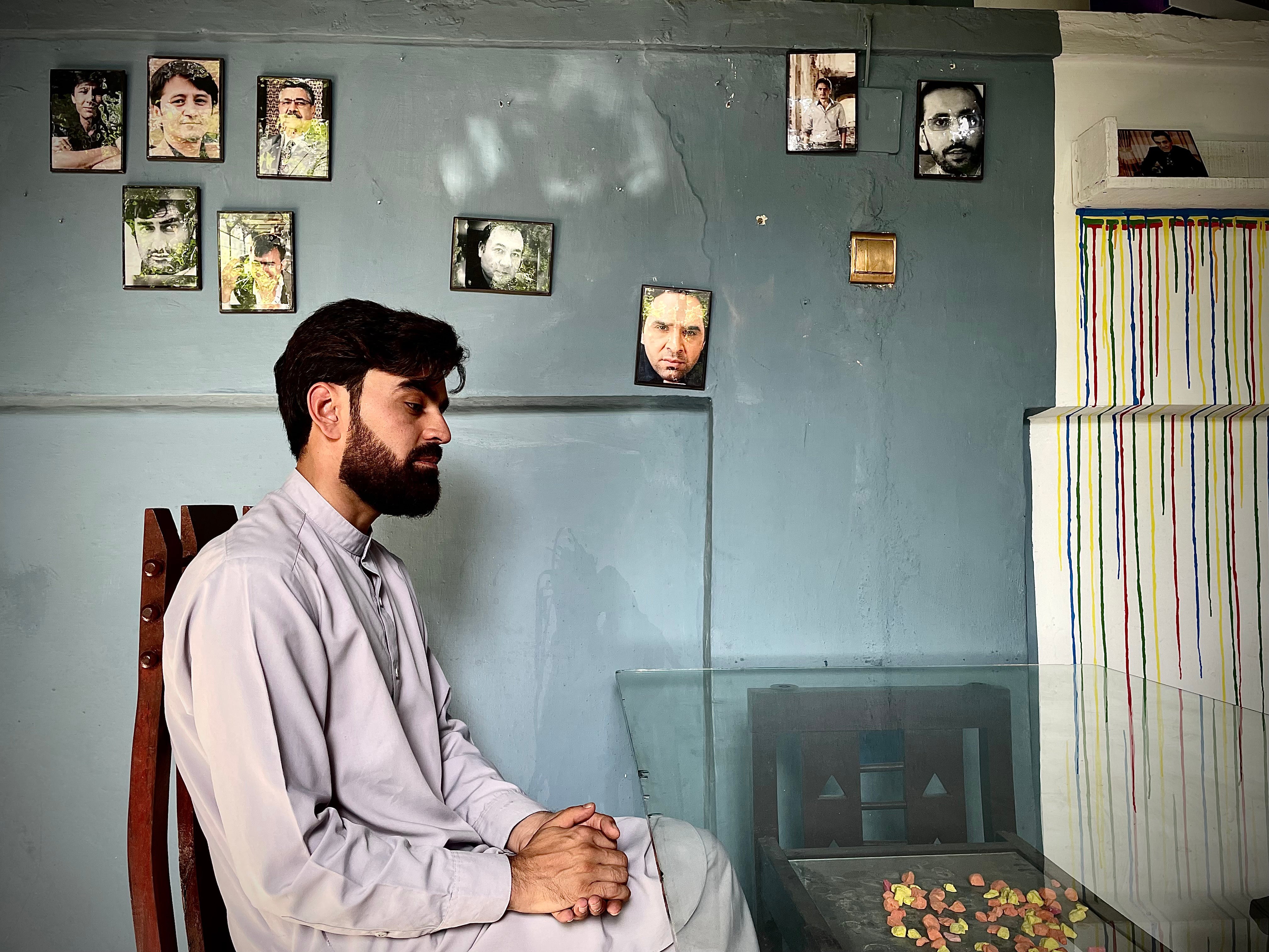 Rohullah Raziqi says the Taliban forced the cafe’s owners to take down photos of inspirational women, leaving only men on the wall