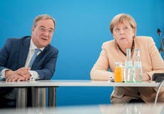 Merkel's party ahead in local votes in northern German state