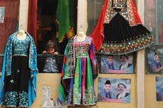 Afghan women share pictures of their traditional attire as Taliban announces new rules