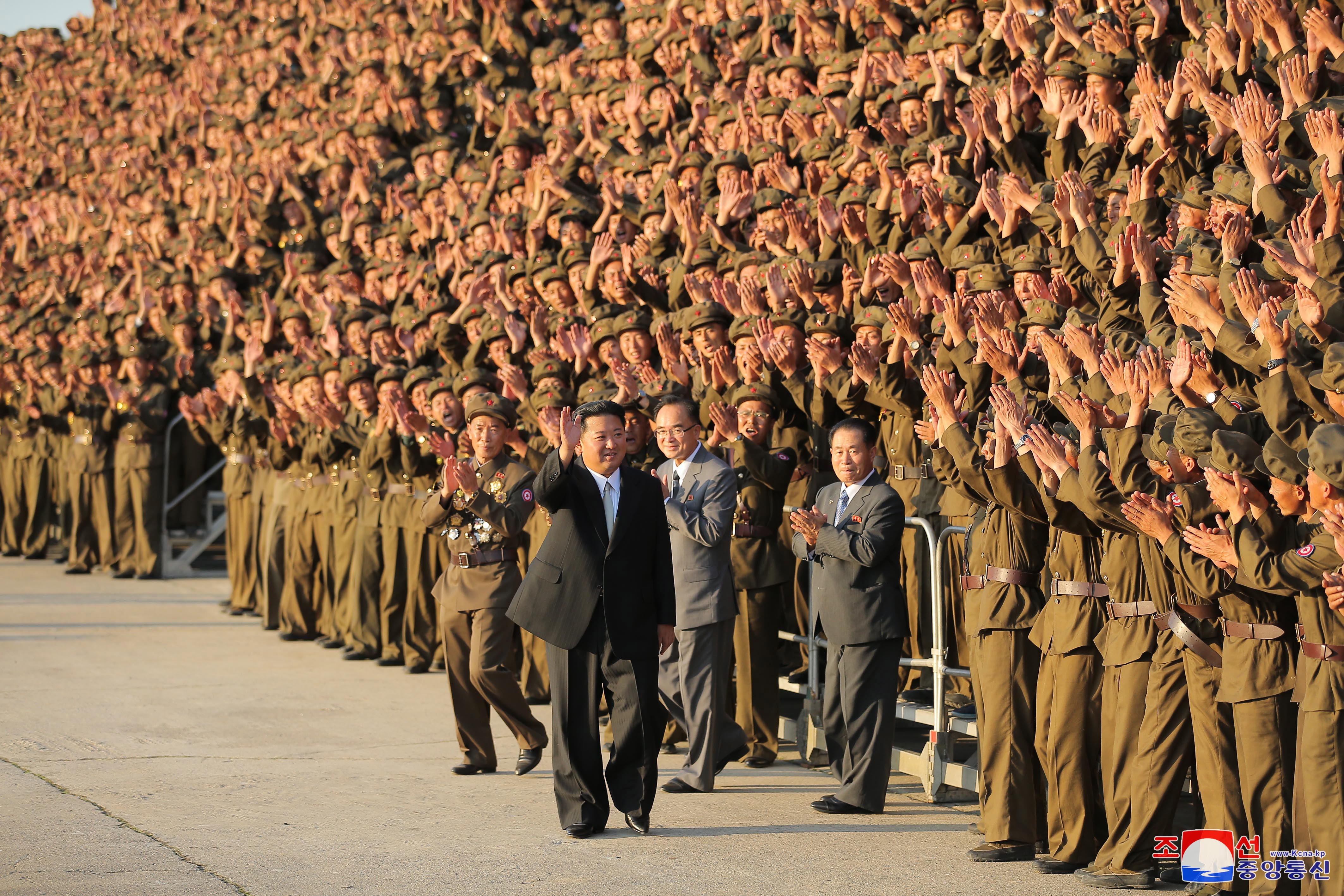 Kim Jong-un waves to paramilitary and public security forces on the 73rd founding anniversary of the Democratic People’s Republic of Korea in Pyongyang, North Korea