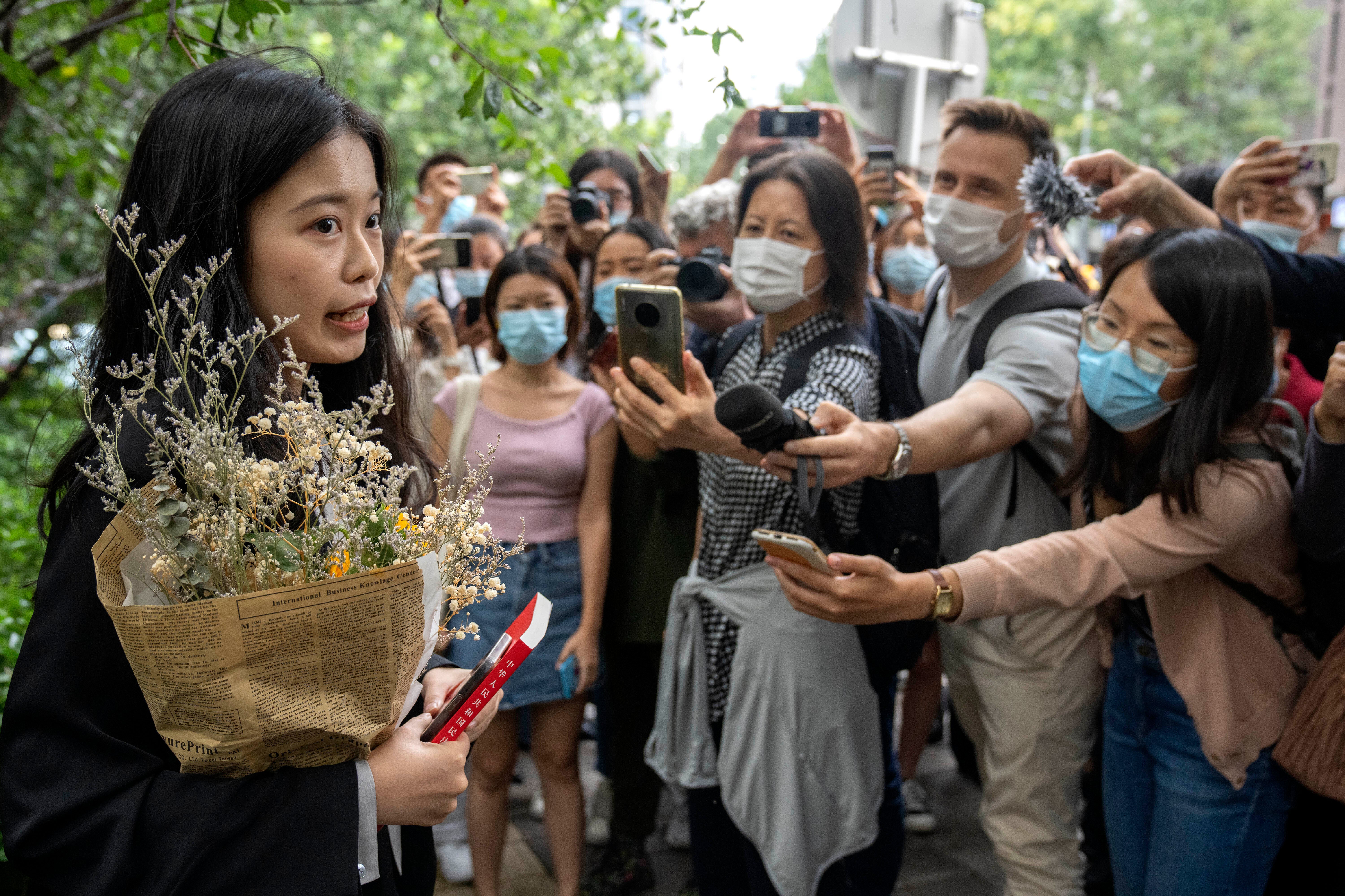 Zhou Xiaoxuan, a former intern at China’s state broadcaster CCTV, speaks outside a courthouse