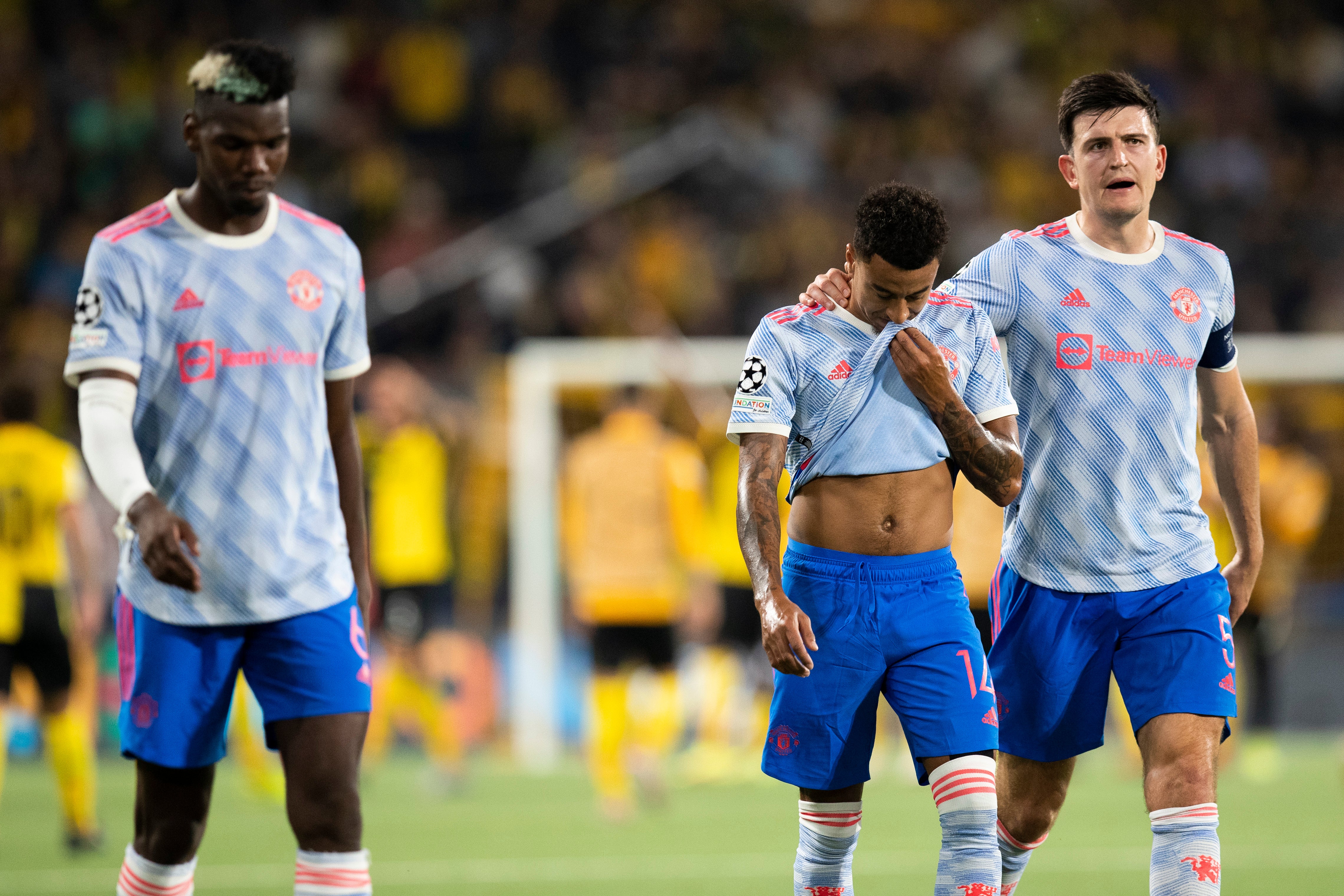 Harry Maguire led Manchester United in defeat on Tuesday (Peter Klaunzer/AP)