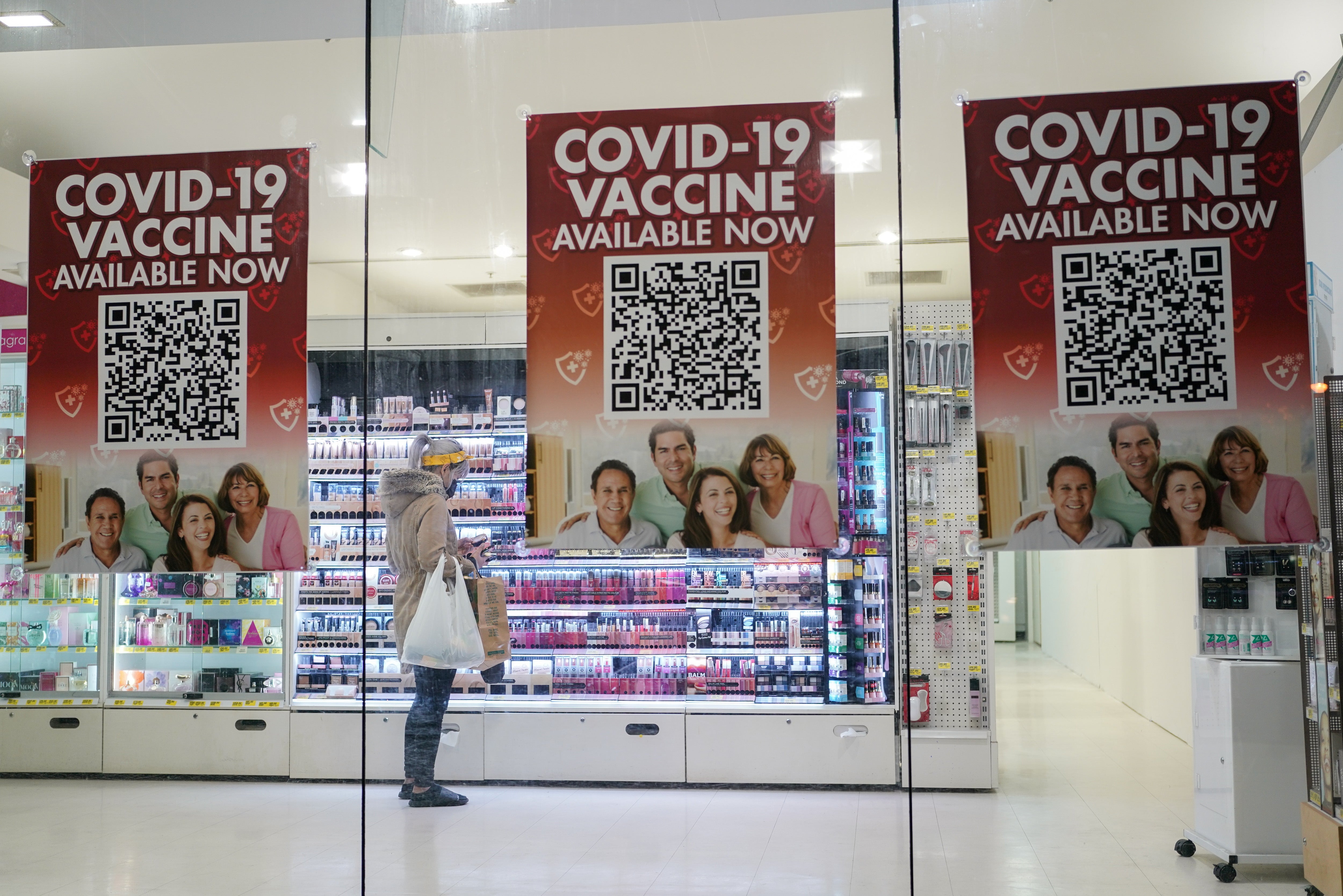 Signs encouraging people to take Covid vaccines in Sydney, Australia. Darko Desic lost his job after Sydney’s Covid lockdown began in June