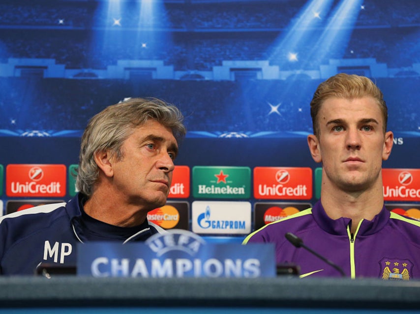 Manuel Pellegrini and Joe Hart in 2014