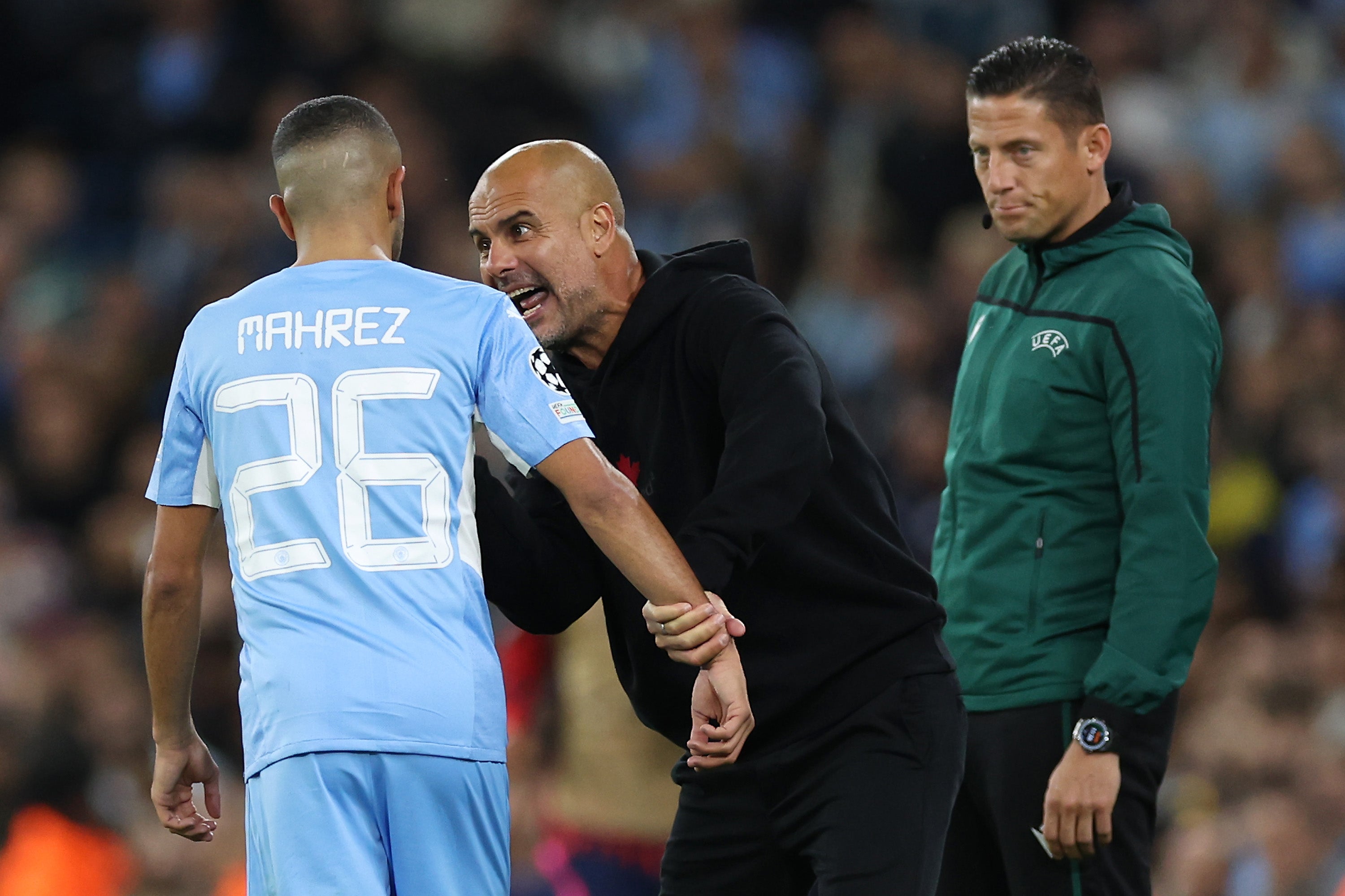 Pep Guardiola gives Riyad Mahrez some instructions