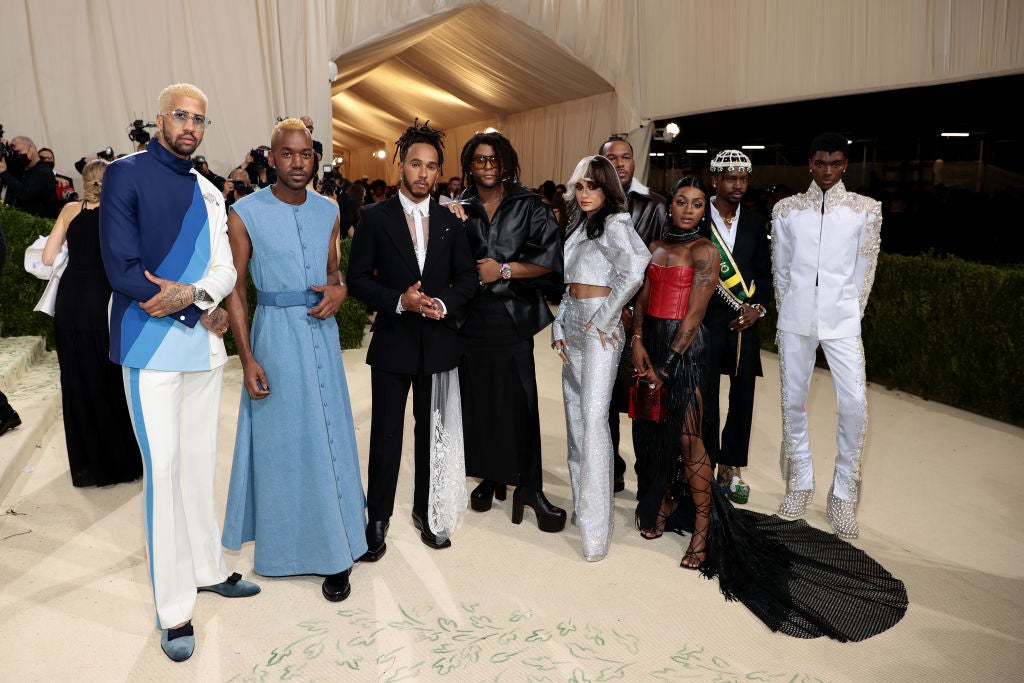 Defending F1 champion Lewis Hamilton (third left) at the Met Gala