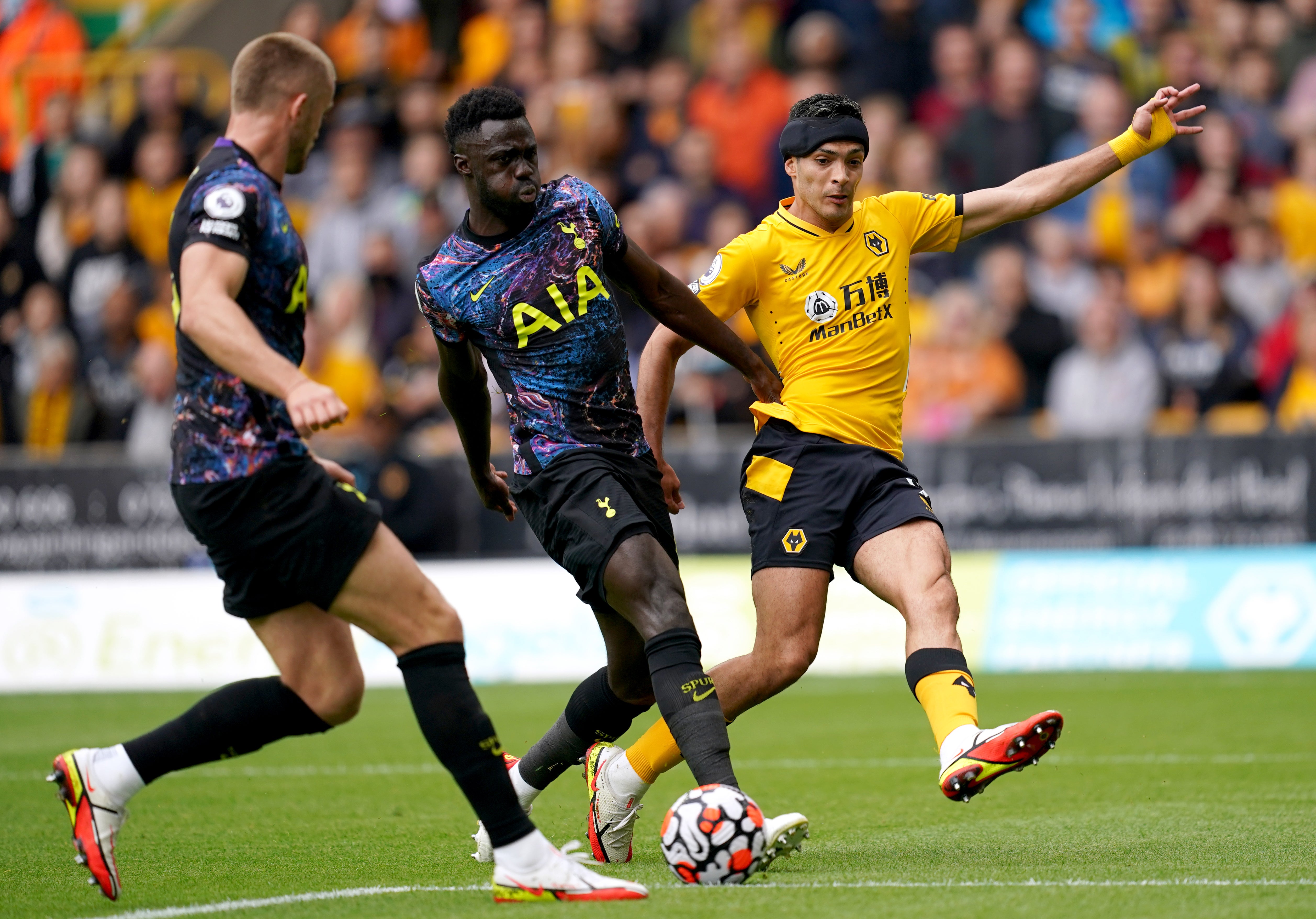 Davinson Sanchez, centre, is one of Tottenham’s recent absentees (David Davies/PA)