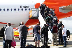 Covid travel news: Government to introduce charges for tests, as bookings surge after rules eased