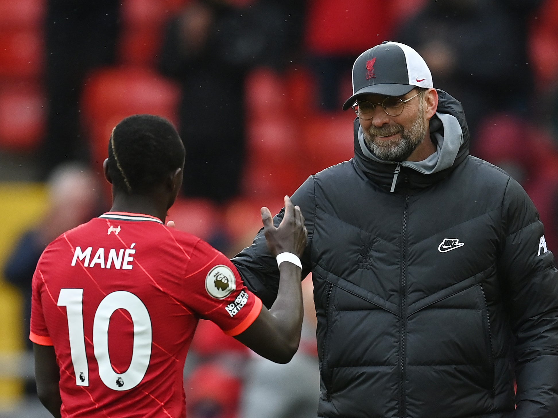 Liverpool forward Sadio Mane with coach Jurgen Klopp