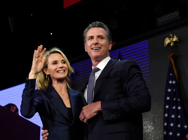 <p>California Governor Gavin Newsom and his wife Jennifer Siebel Newsom pictured in 2018</p>