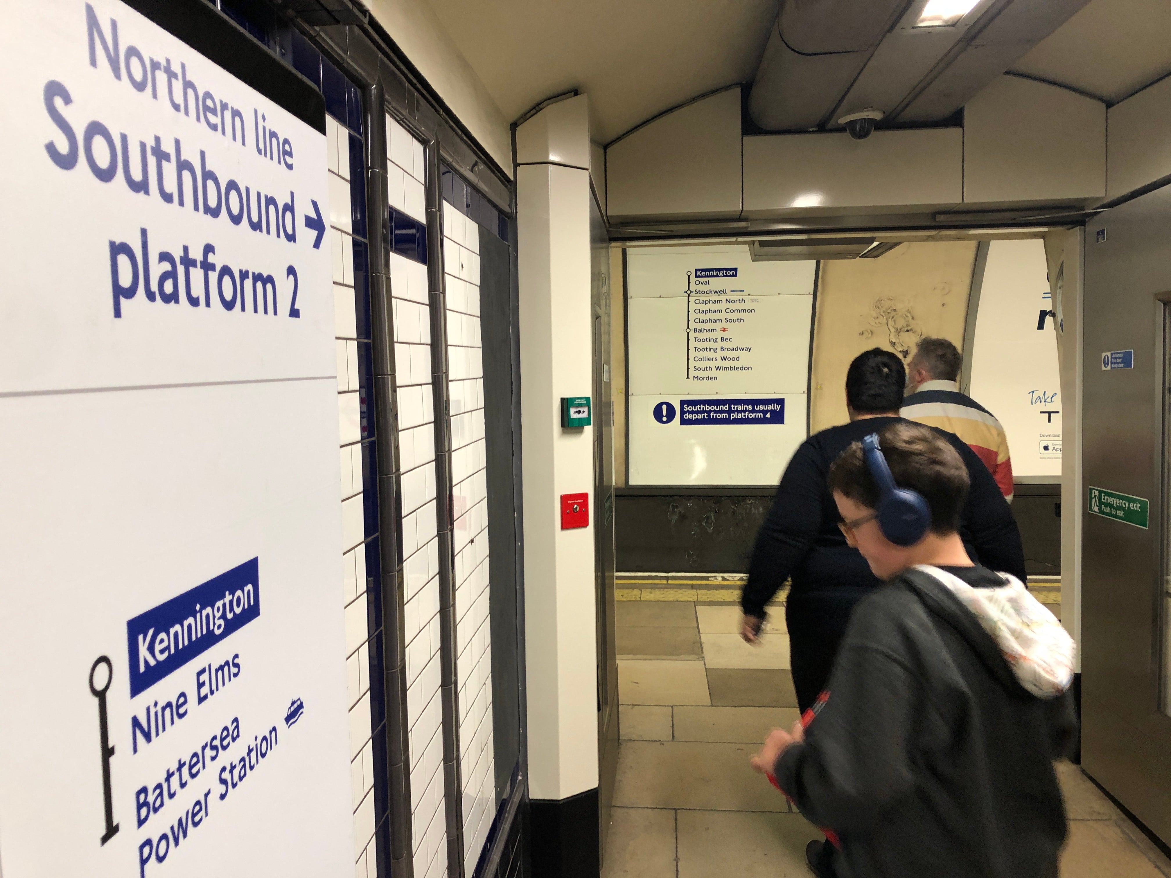 Where next? Travellers at Kennington station in south London waiting for the first train to Battersea Power Station