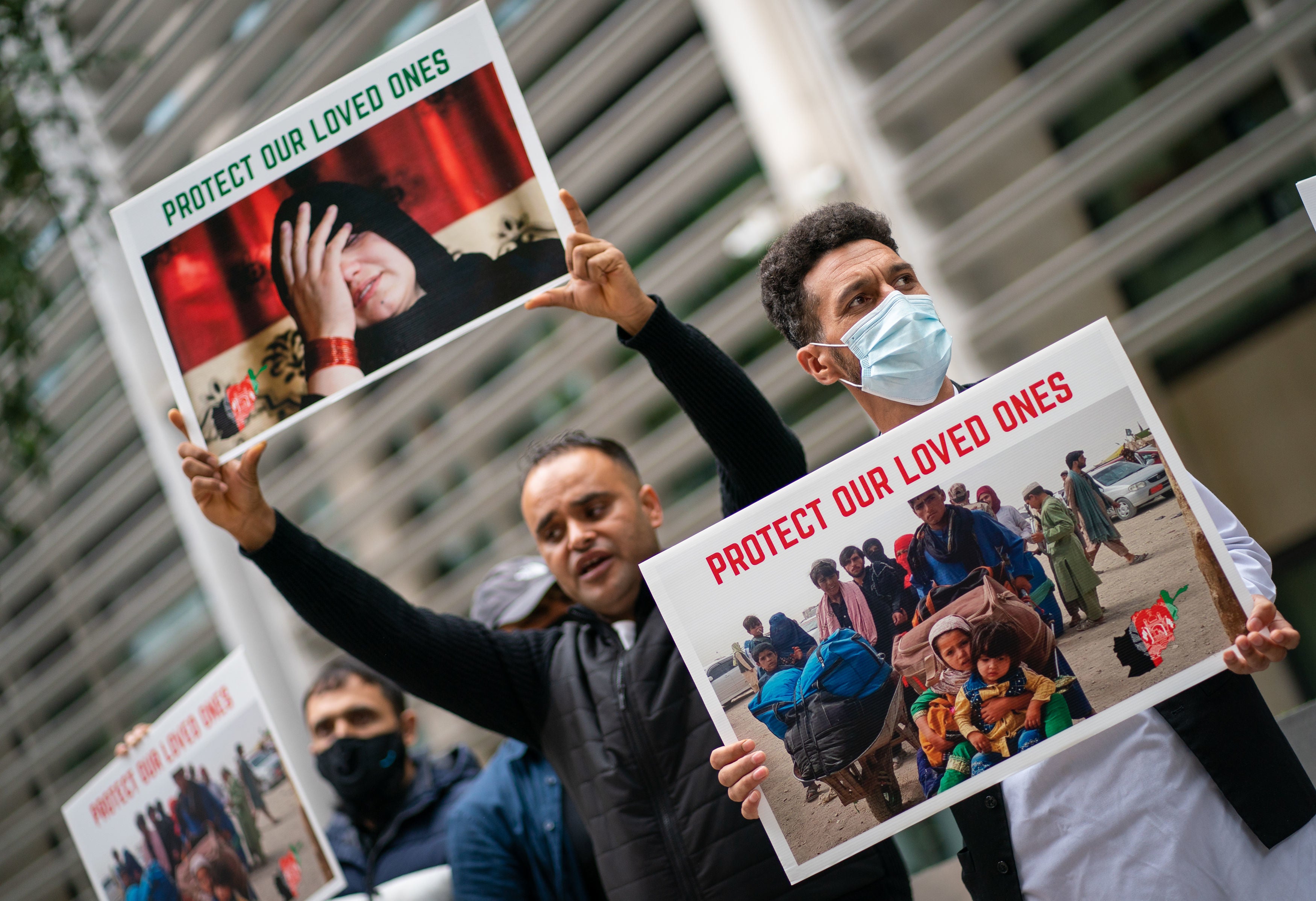 Former Afghan interpreters who are already in the UK protest outside the Home Office in 2021