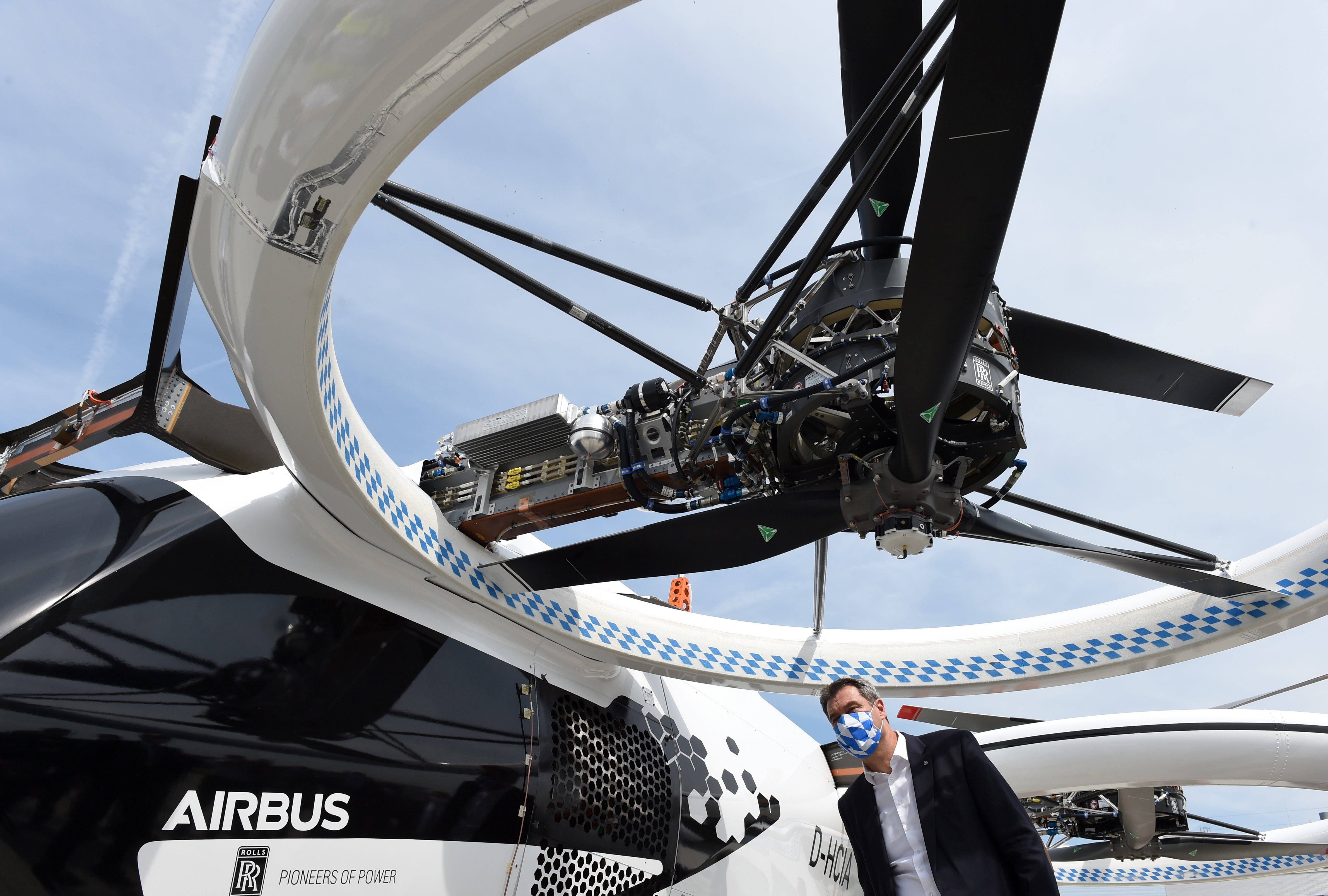 Bavaria's State Premier Markus Soeder looks at an electric helicopter during his visit to the Airbus helicopters production site in Donauwoerth, southern Germany, on July 20, 2020.