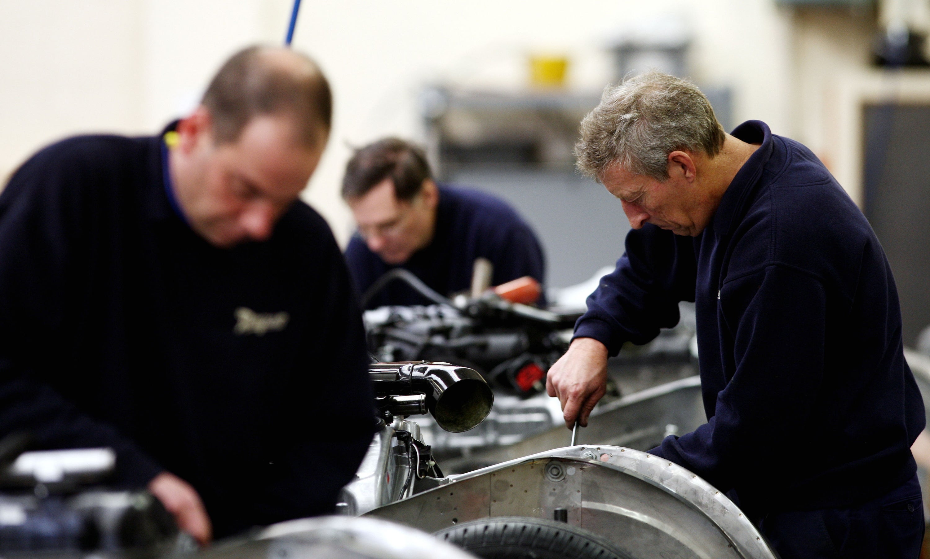 UK factories have seen order books swell to a record high this month but output growth slowed sharply, according to a survey (PA)