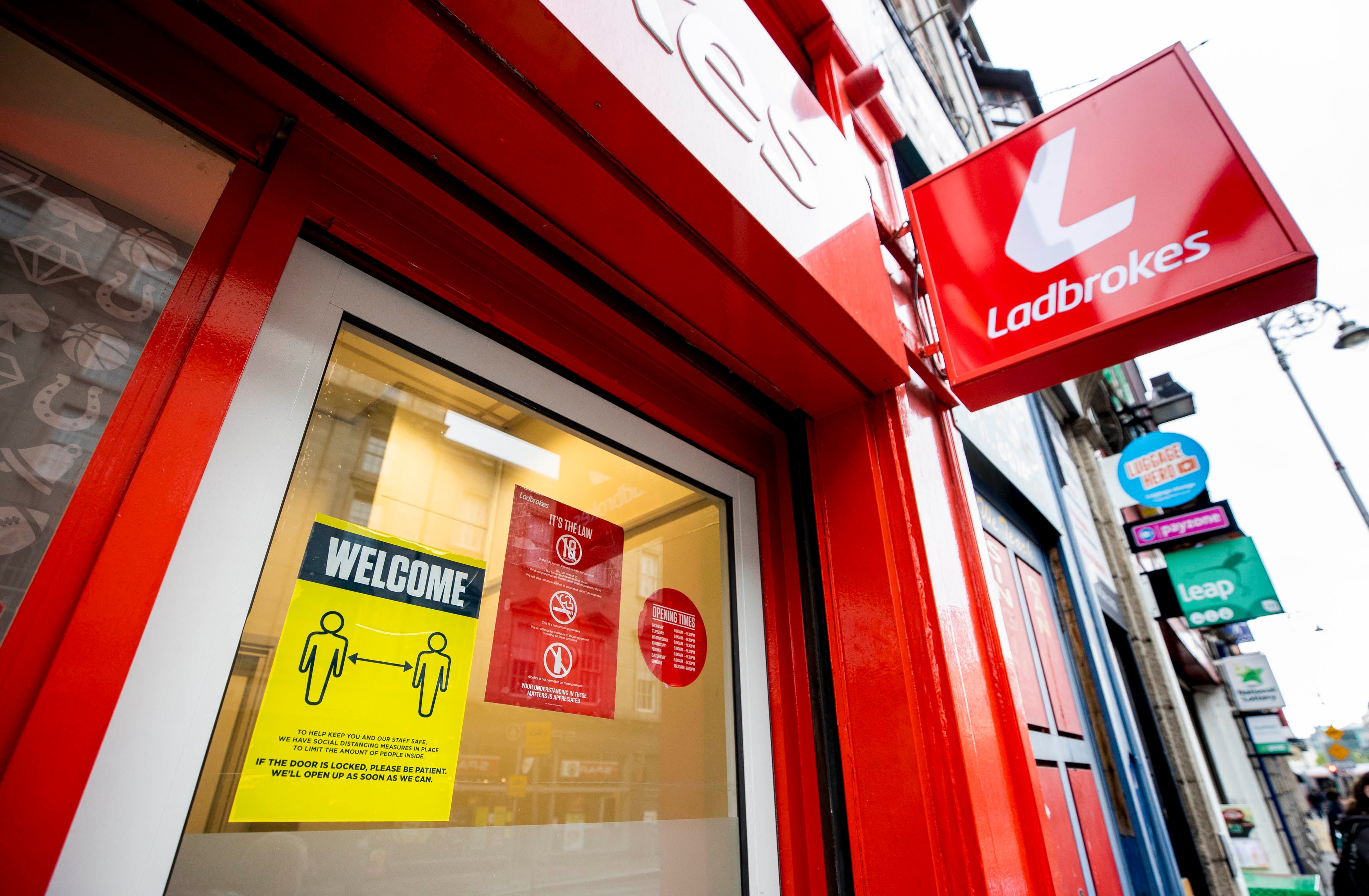 Ladbrokes’s owner is understood to be facing a bid from US rival Draftkings (Liam McBurney/PA)