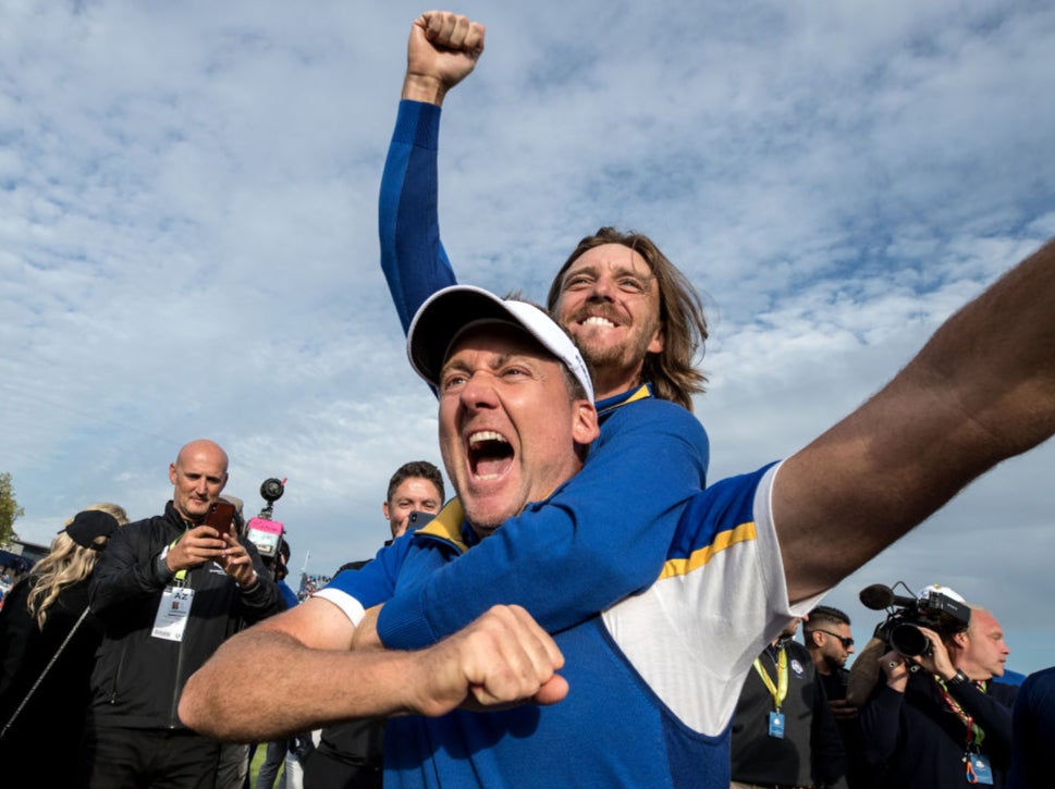 We’ll always have Paris: Ian Poulter and Tommy Fleetwood celebrate victory after the singles matches at Le Golf National in 2018