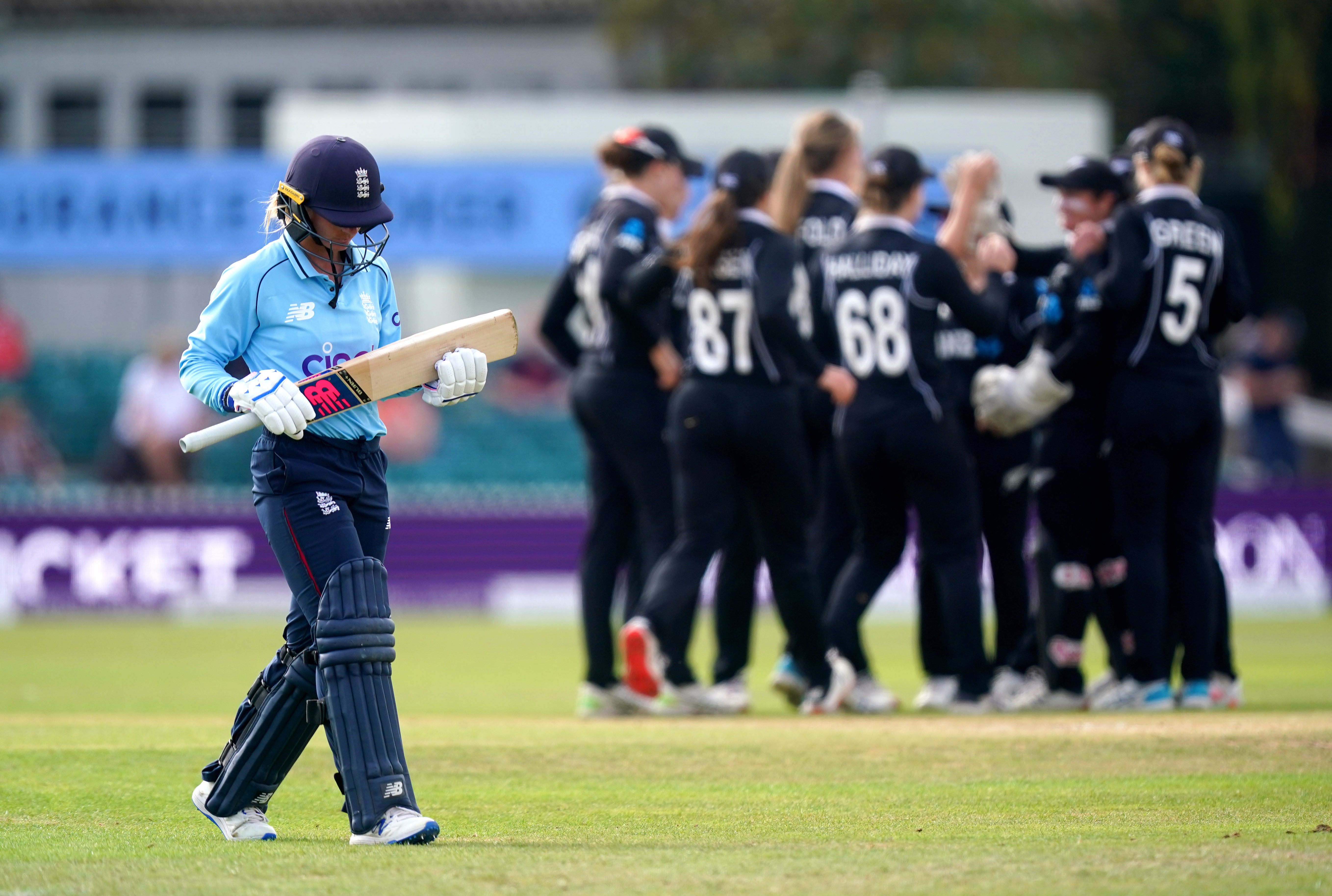 Danni Wyatt leaves the pitch after being caught by New Zealand’s Lauren Down (Mike Egerton/PA)