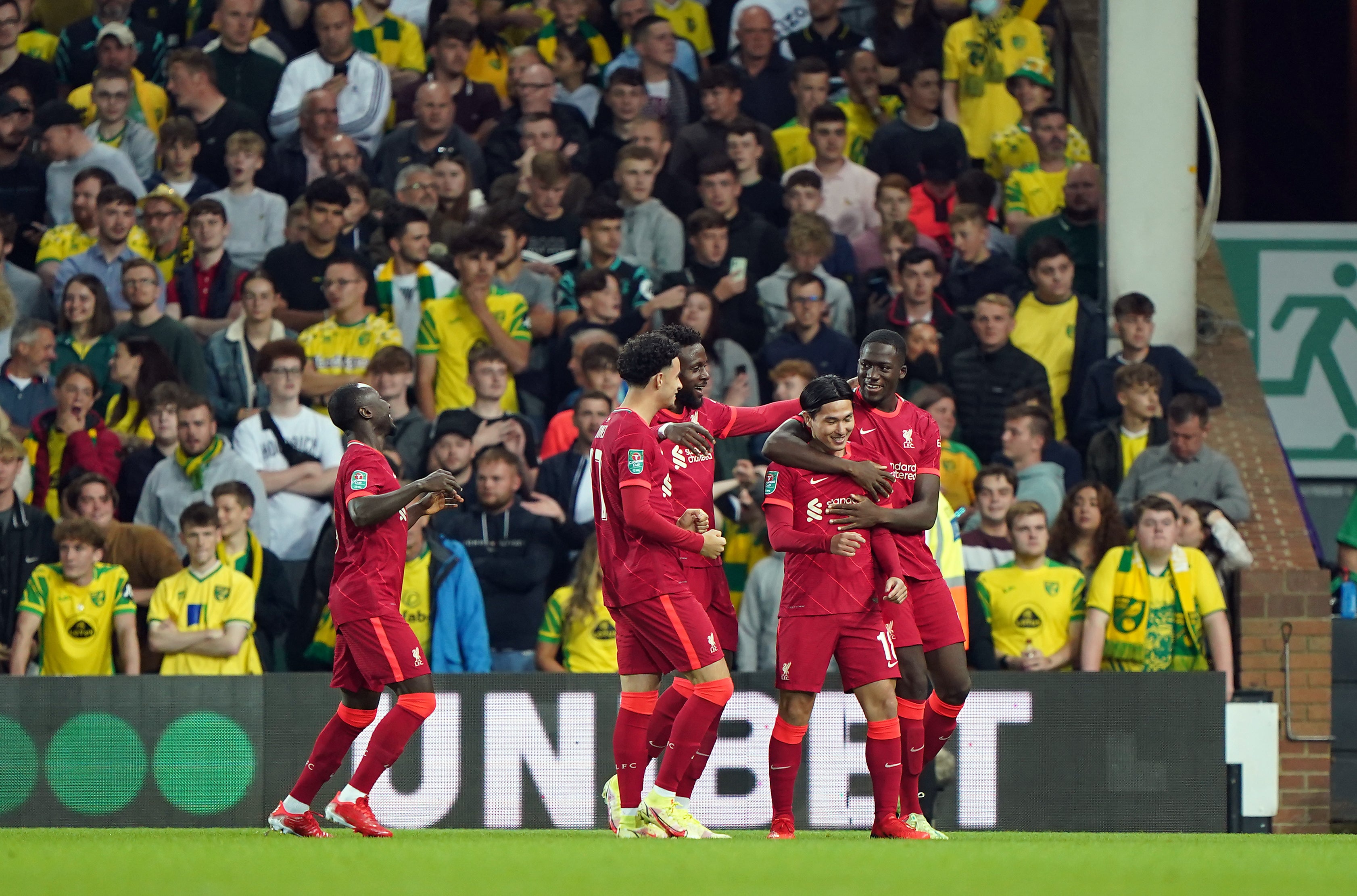 Takumi Minamino scored twice in Liverpool’s 3-0 win at Norwich (Joe Giddens/PA)