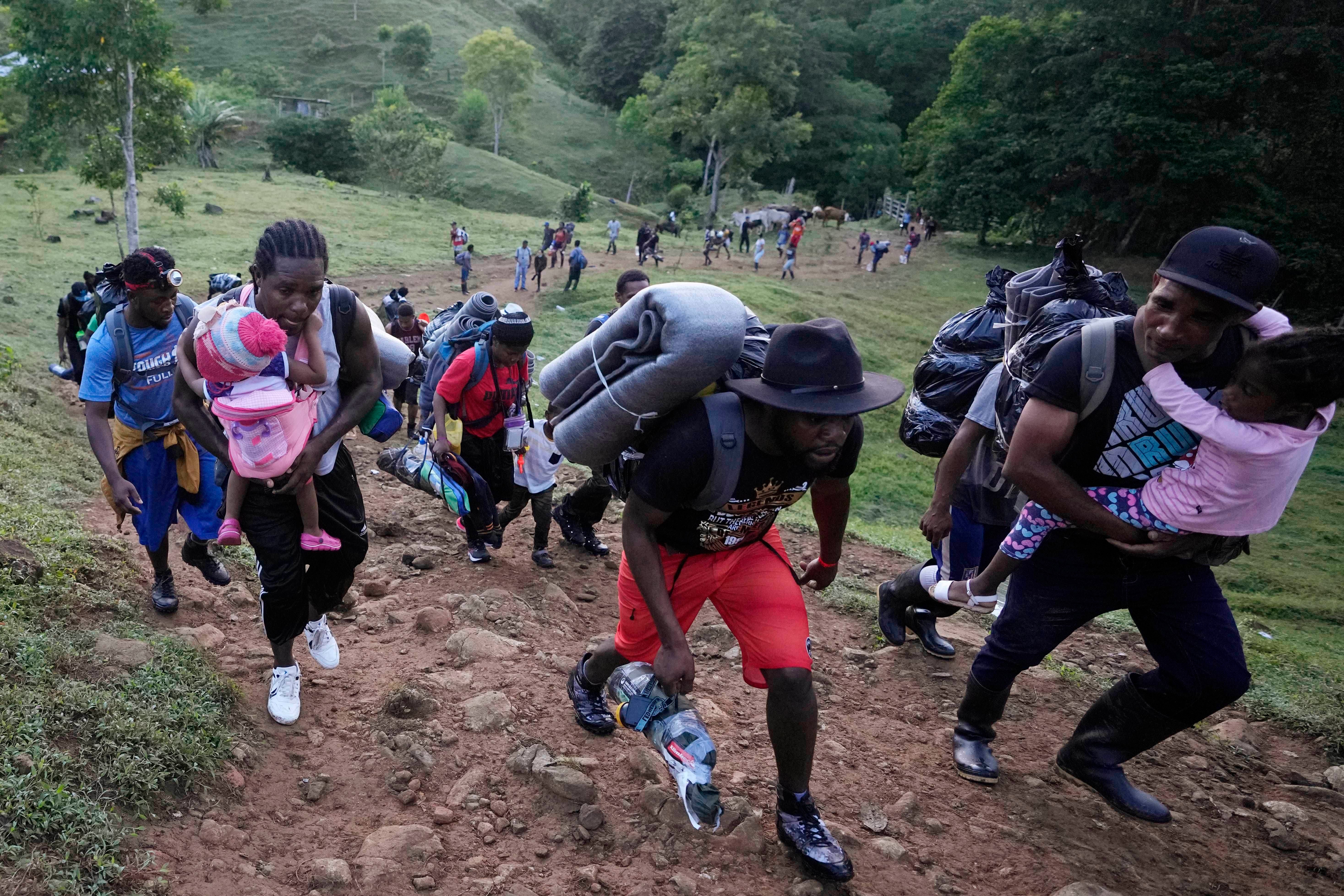 Migrants continue on their trek north, near Acandi, Colombia, Wednesday, 15 September 2021. The migrants, mostly Haitians, are on their way to crossing the Darien Gap from Colombia into Panama dreaming of reaching the US