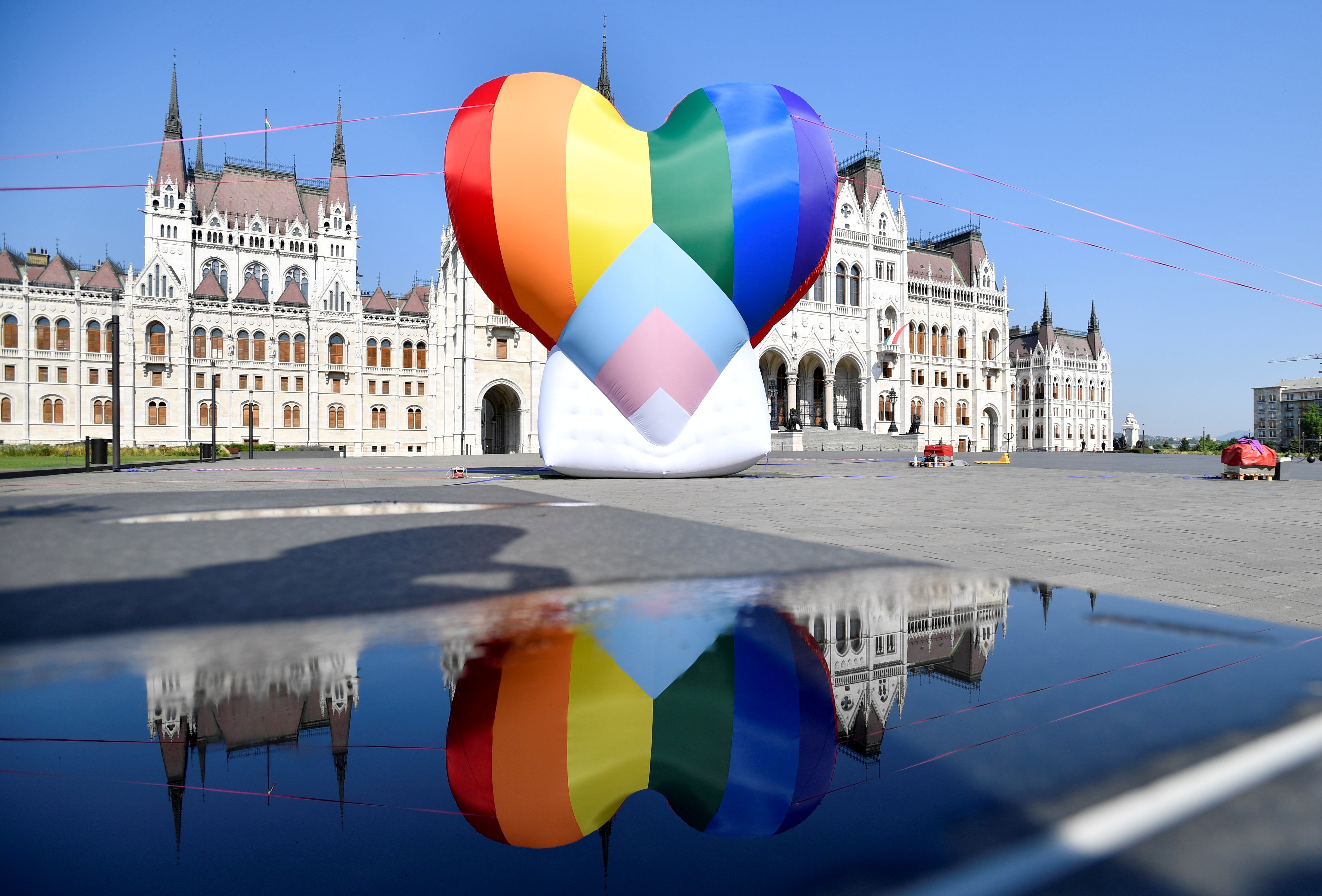 A huge rainbow balloon put up at Hungary’s parliament in protest against anti-LGBT law.