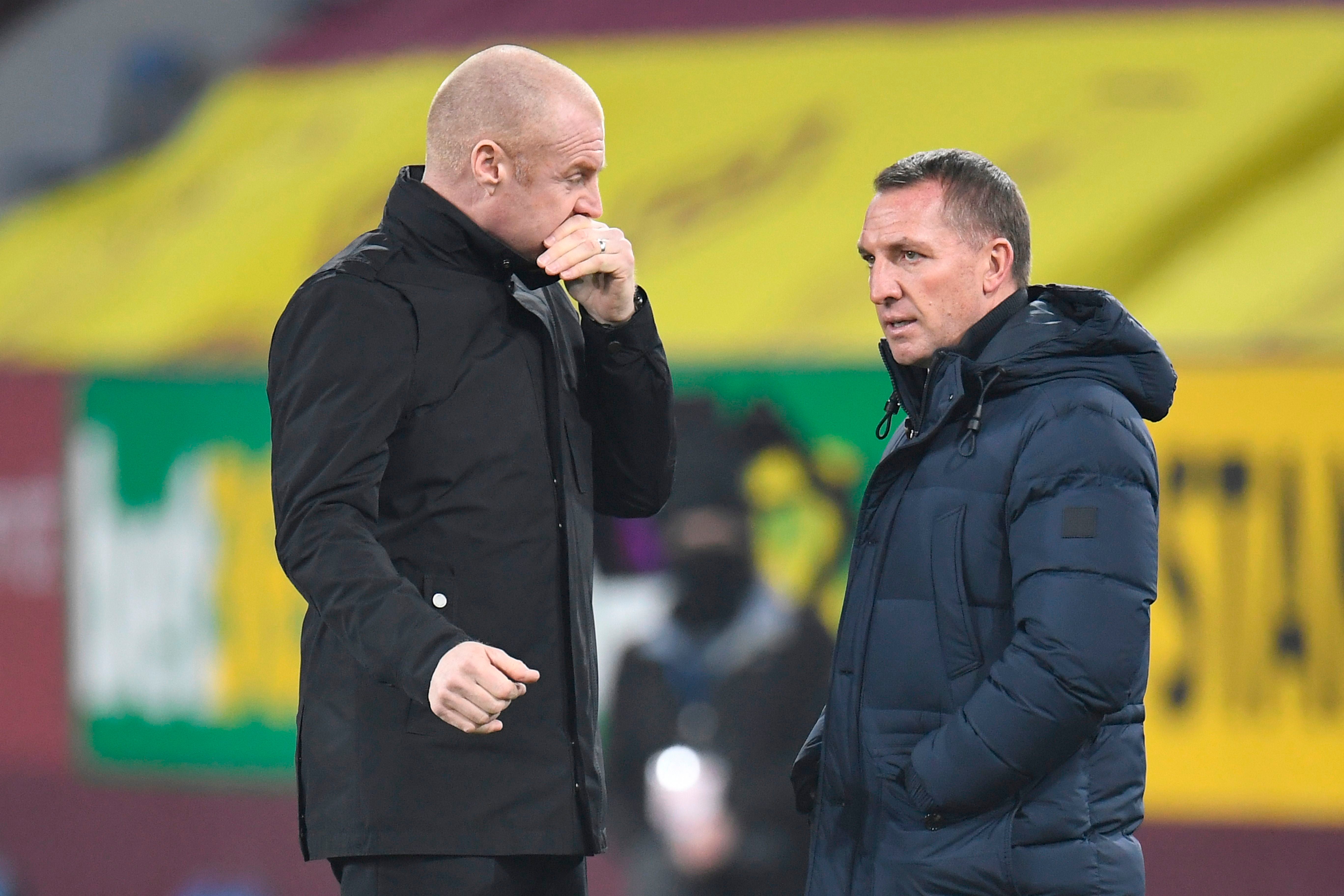 Sean Dyche (left) and his Burnley side take on Brendan Rodgers’ Leicester City