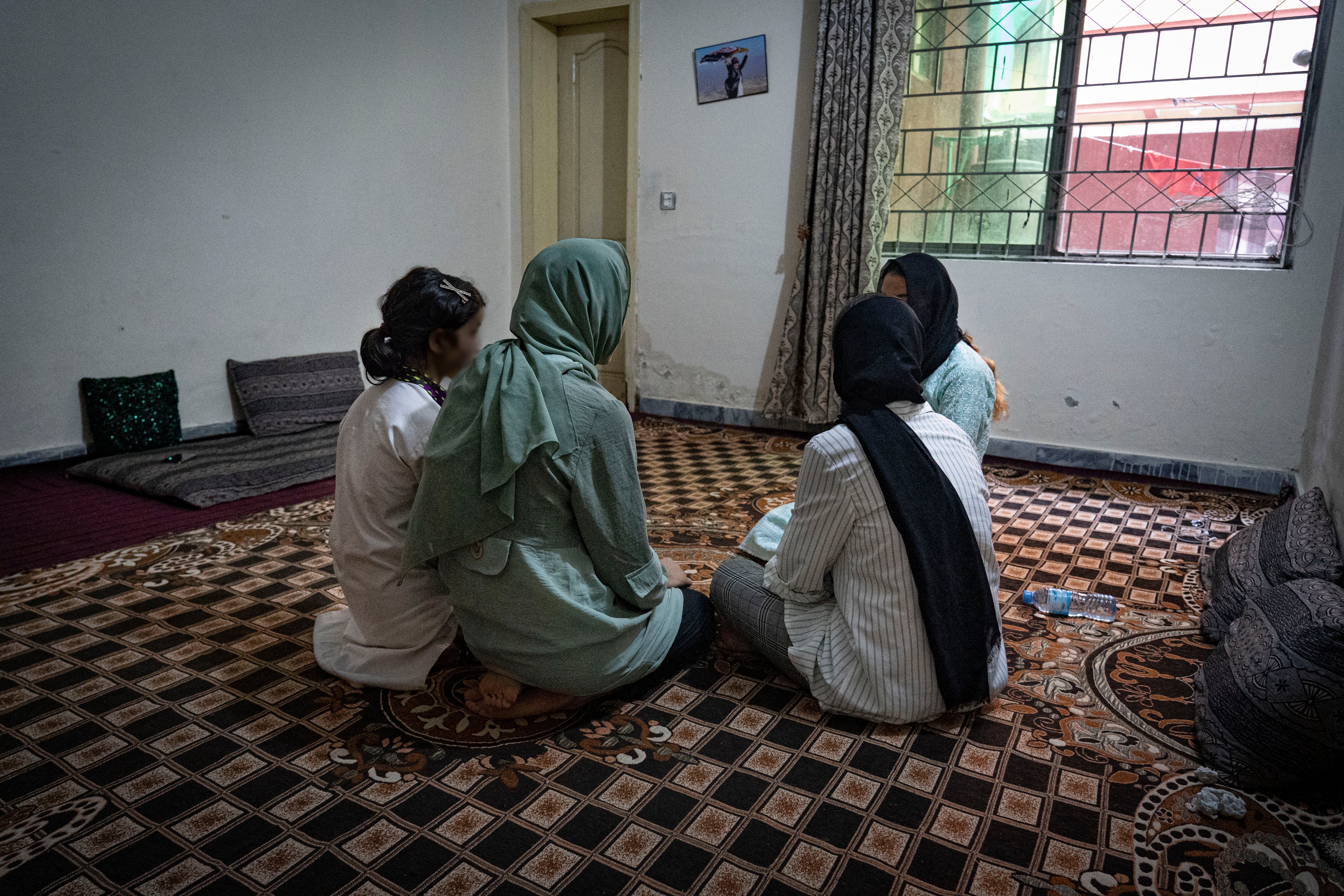 Sima and her sisters in an apartment block outside Islamabad