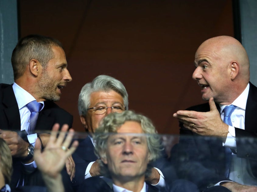 UEFA boss Ceferin (left) and Fifa chief Infantino (right) disagree profusely over the issue